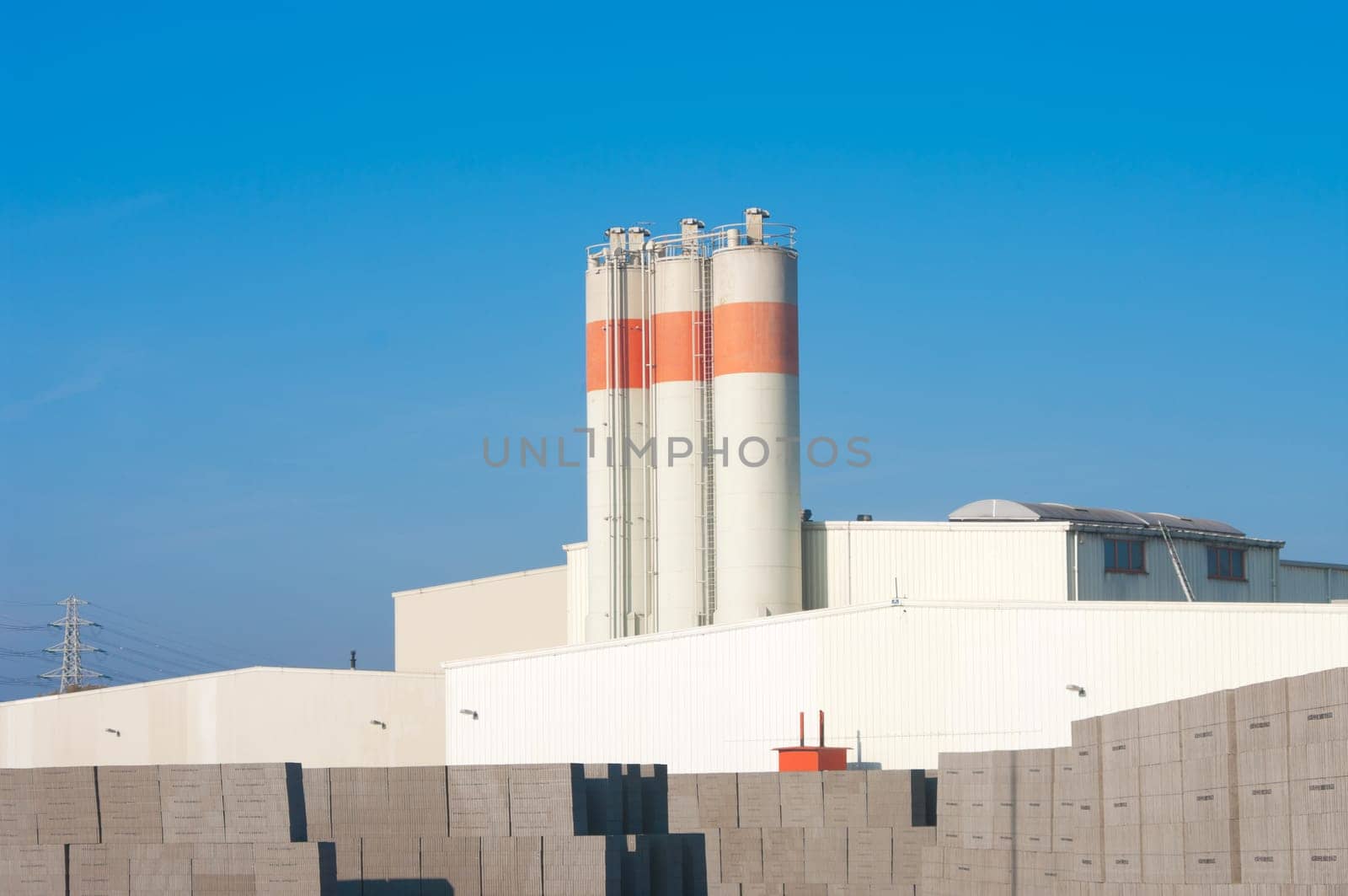 a group of silos as part of a concrete factory