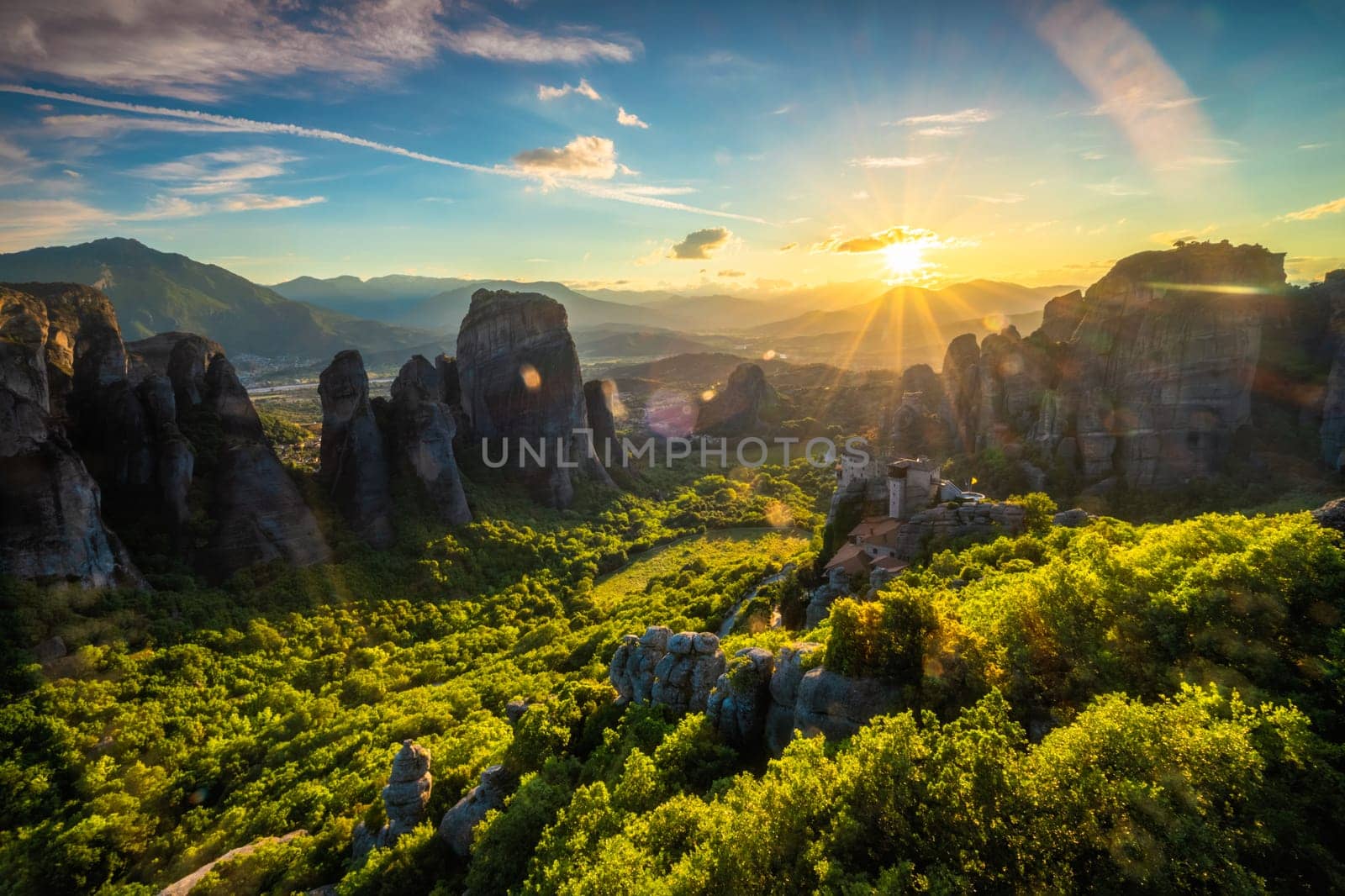 Sunset over monasteries of Meteora by dimol