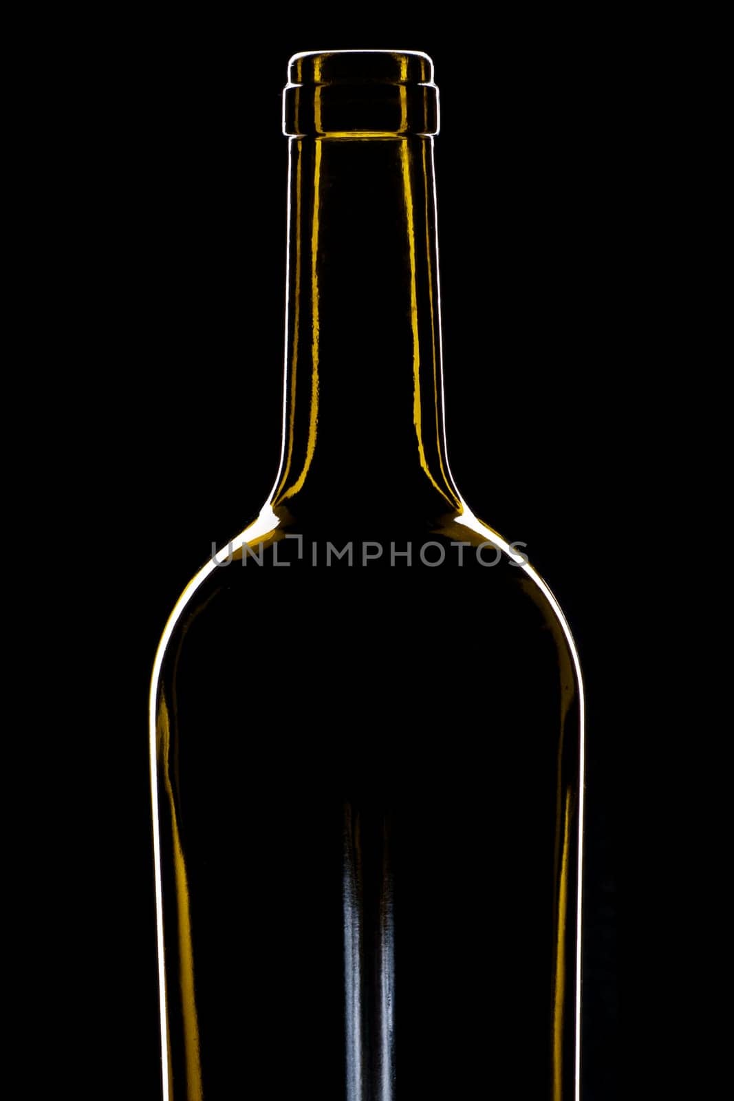 green wine bottle shiny against black background