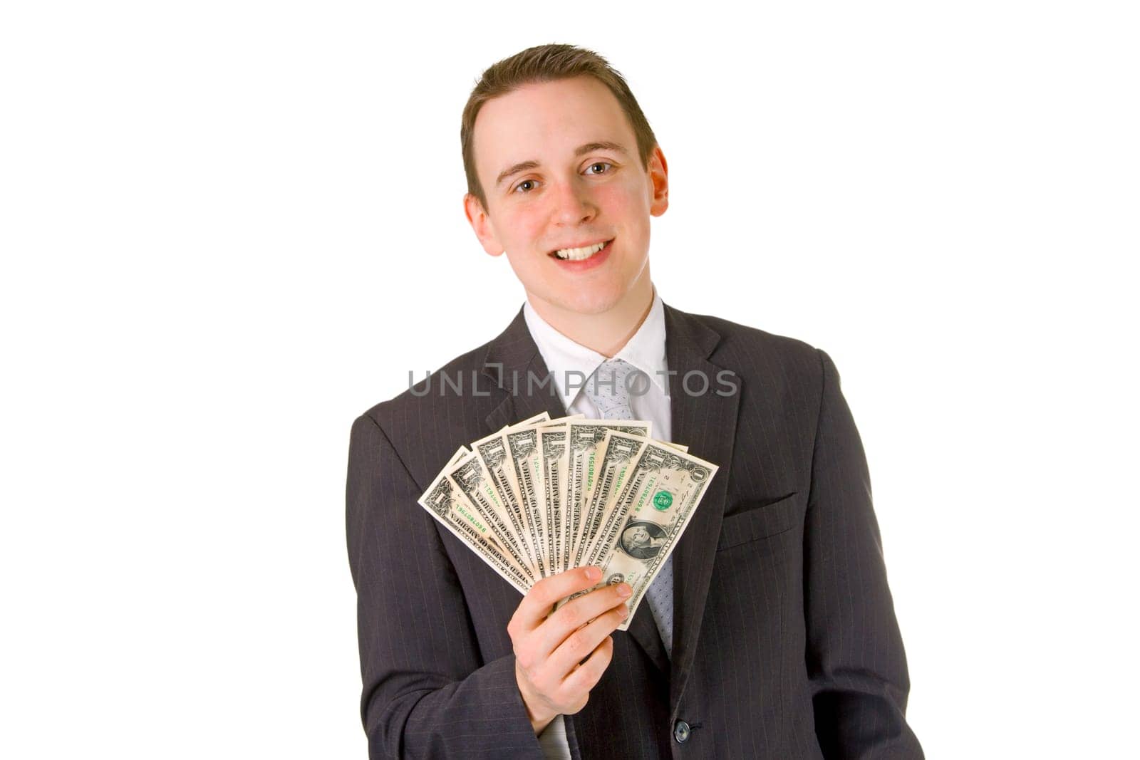 Young businessman with banknotes isolated on white background