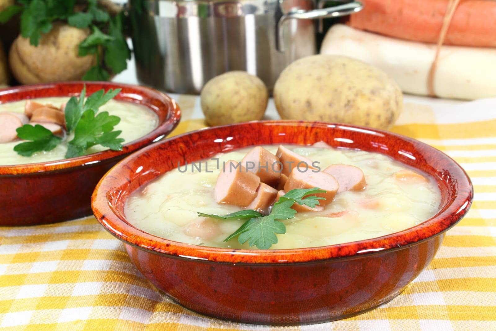 Cream of potato soup with bacon and vegetables