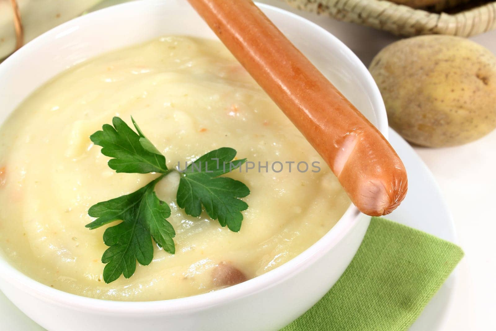 Cream of potato soup with bacon and vegetables