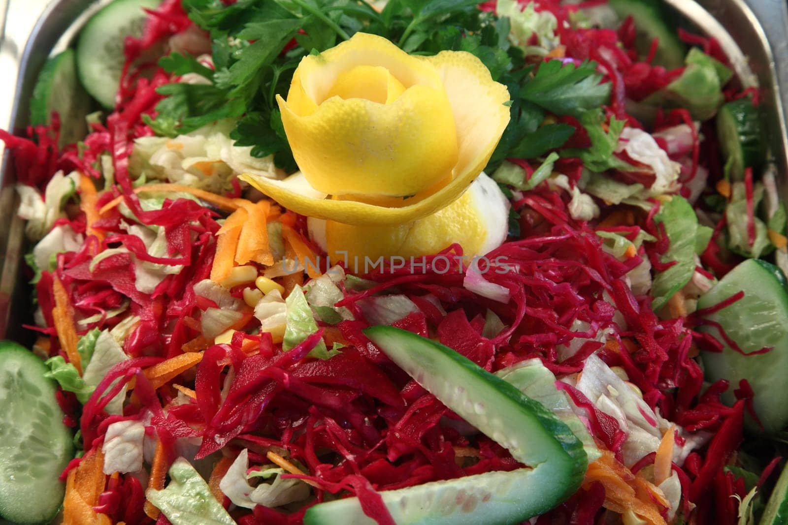 Mixed fresh salad with cucumber and carrots