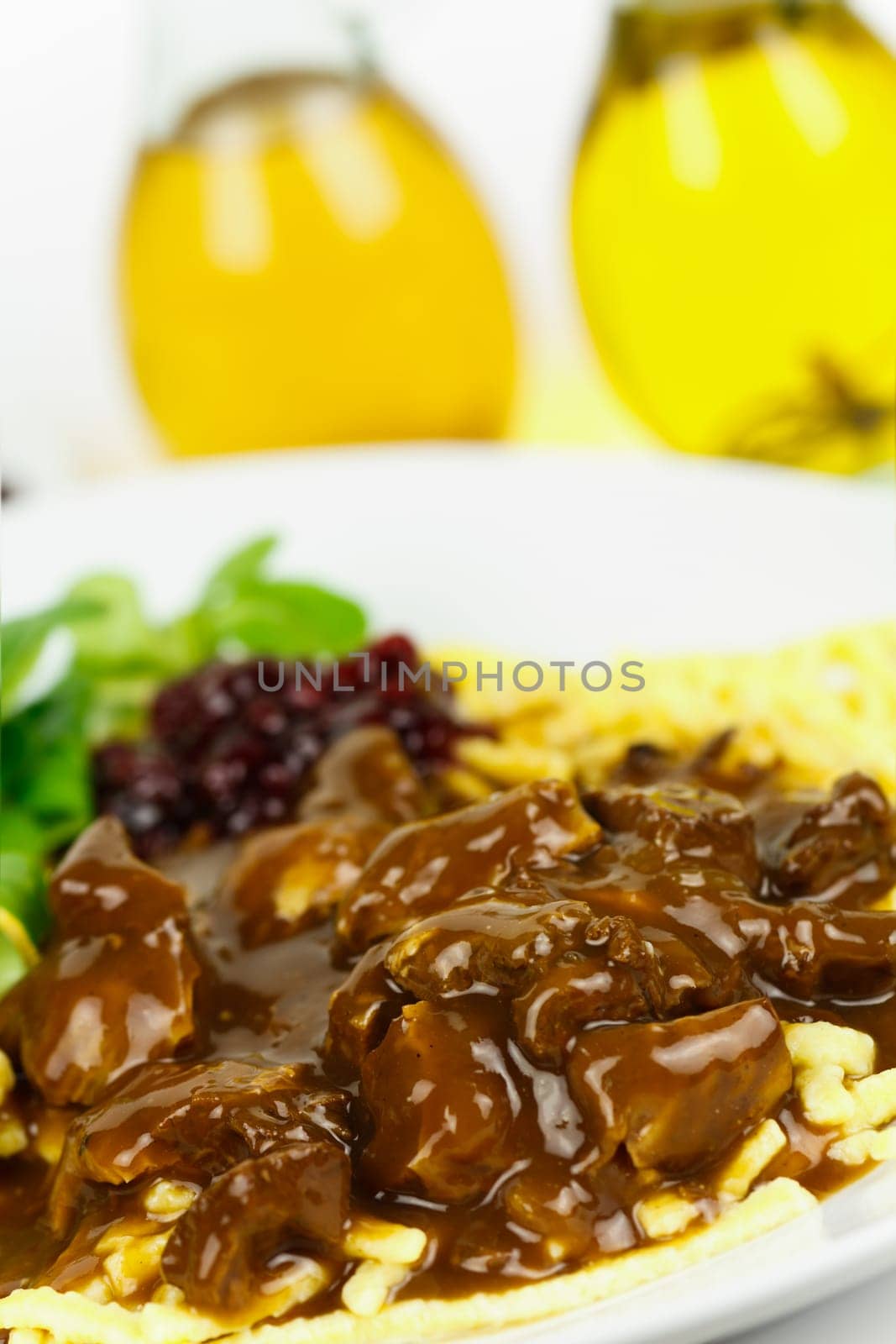 Venison ragout with spaetzle,cream,cranberries,lamb's lettuce