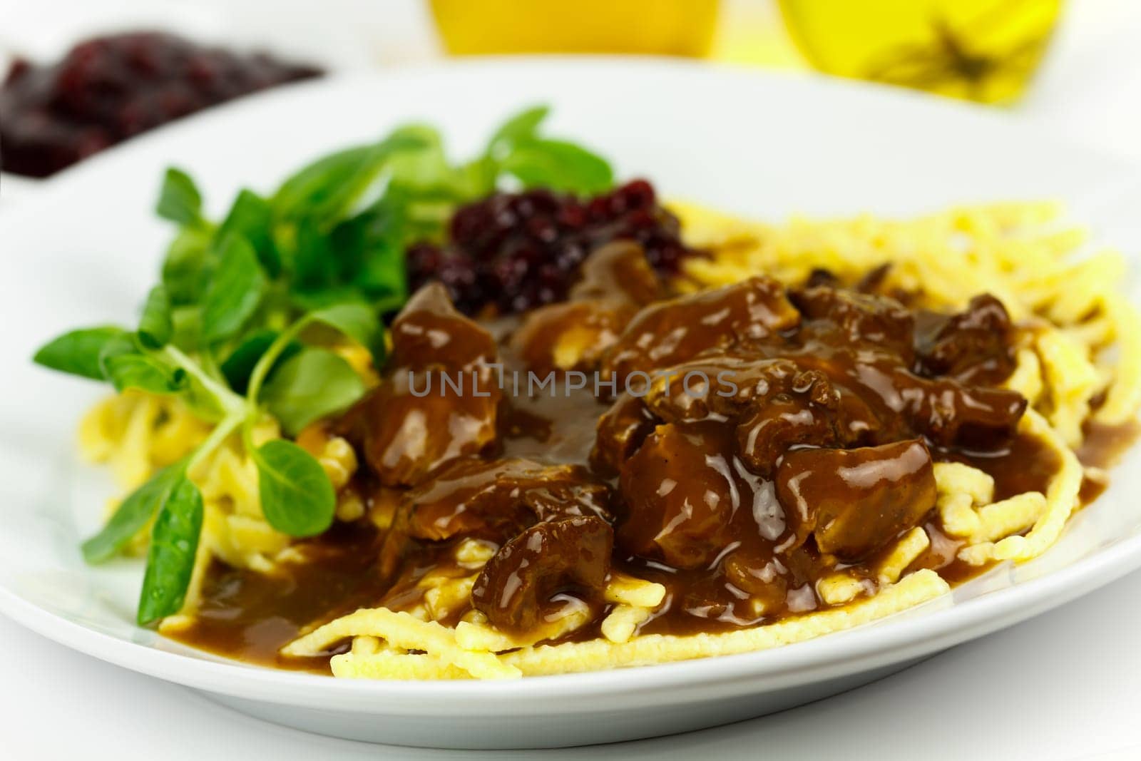 Venison ragout with spaetzle,cream,cranberries,lamb's lettuce