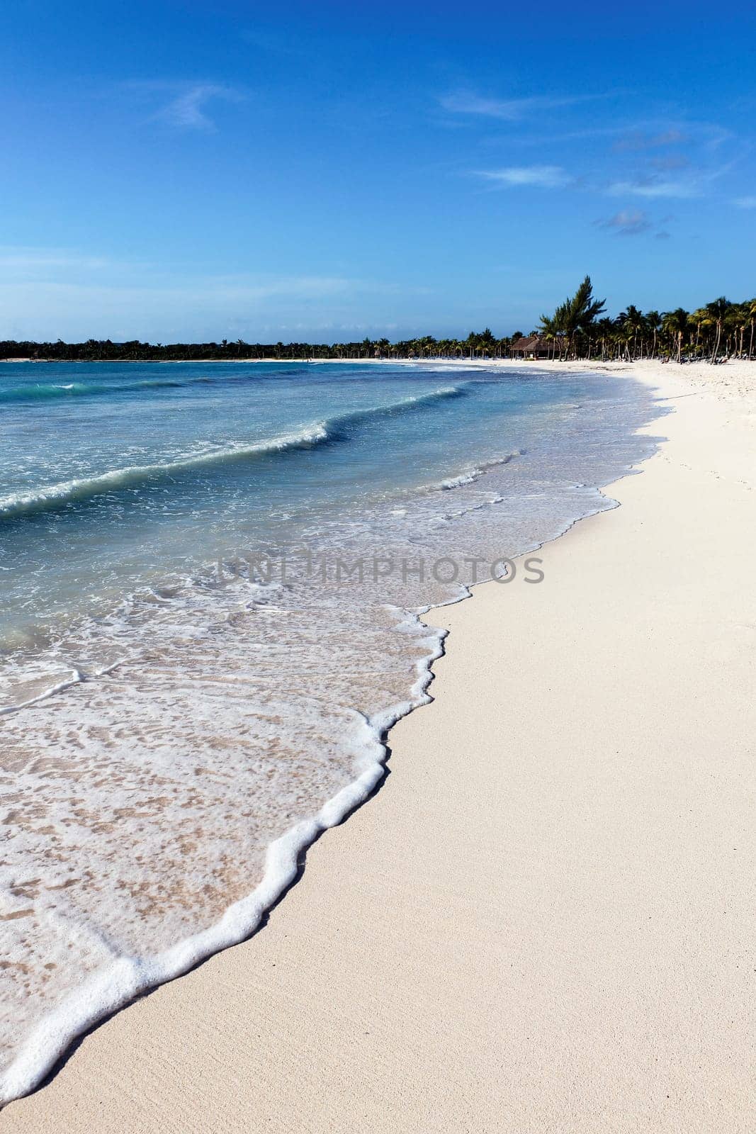 mexican beach with wave on the sand