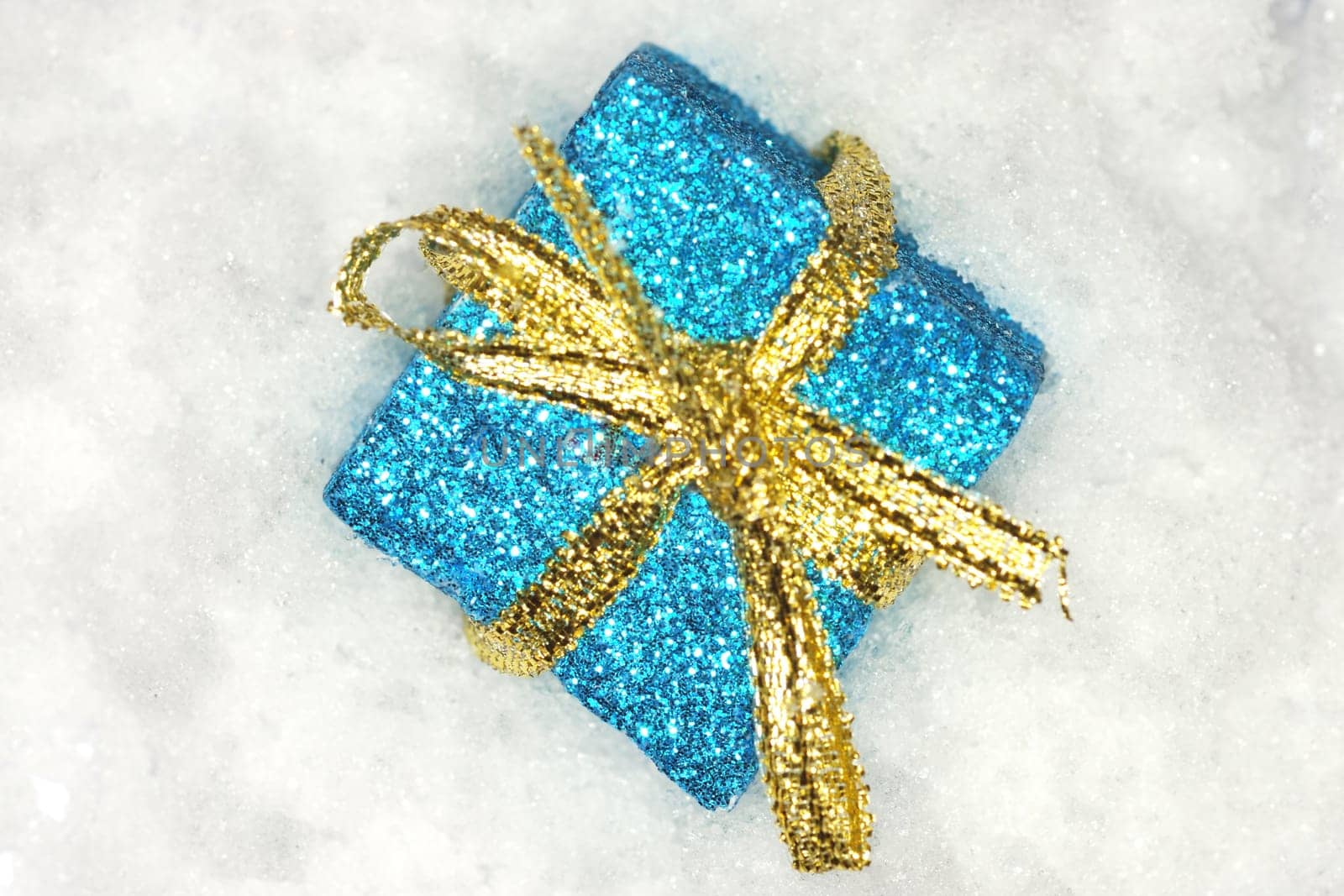 Blue parcel in snow