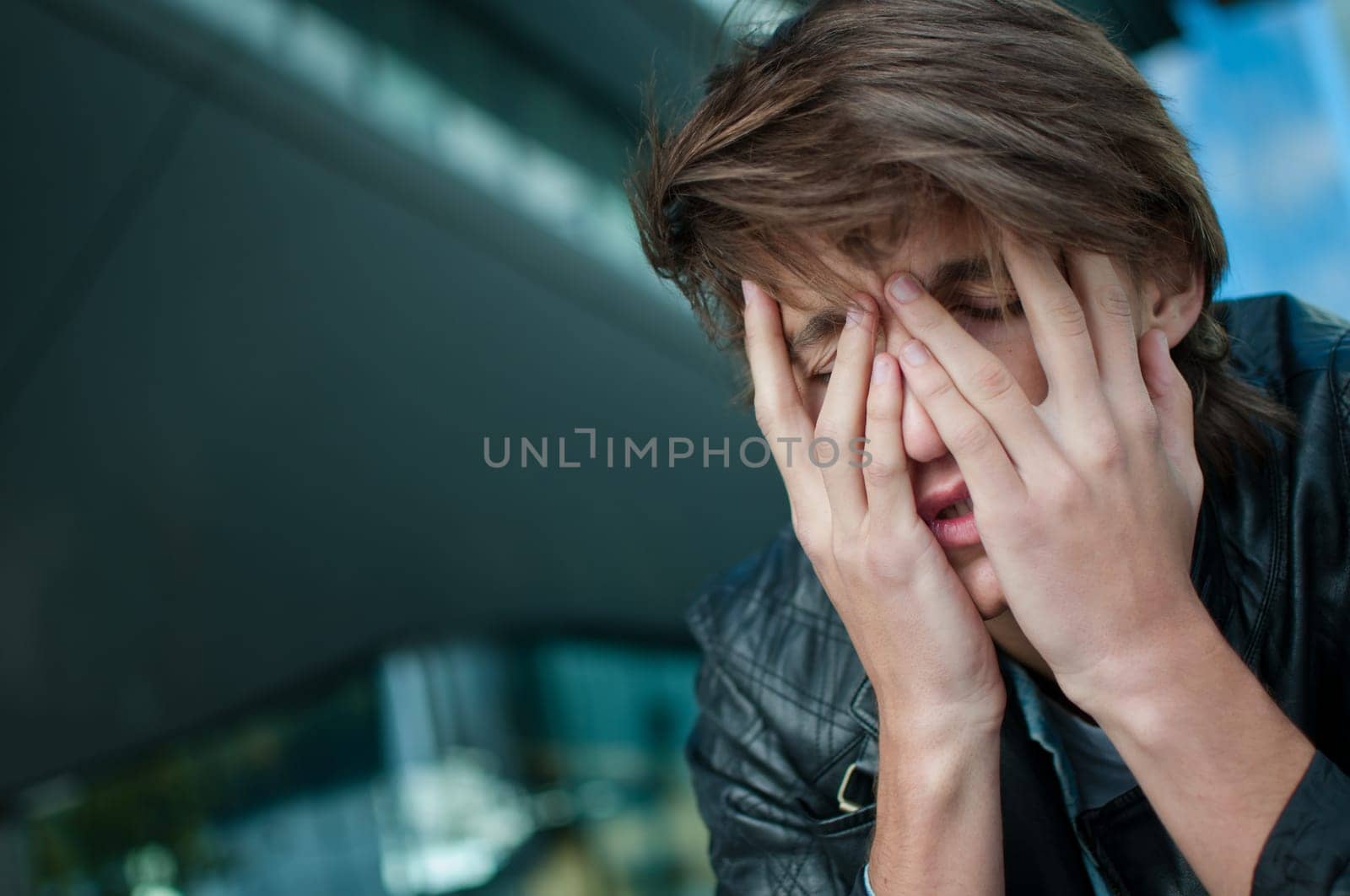 Depression - man with head in hands
