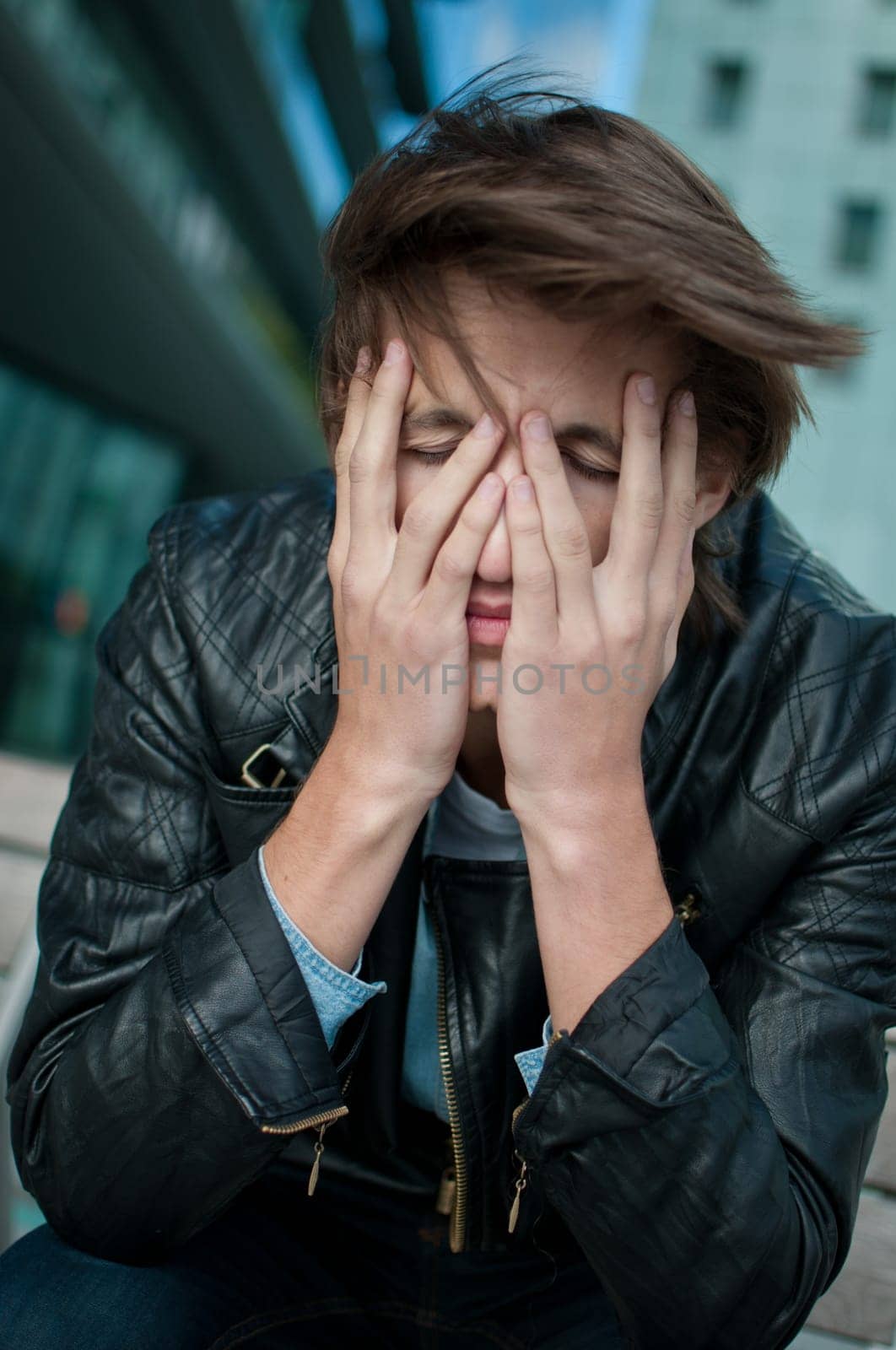 Depression - man with head in hands