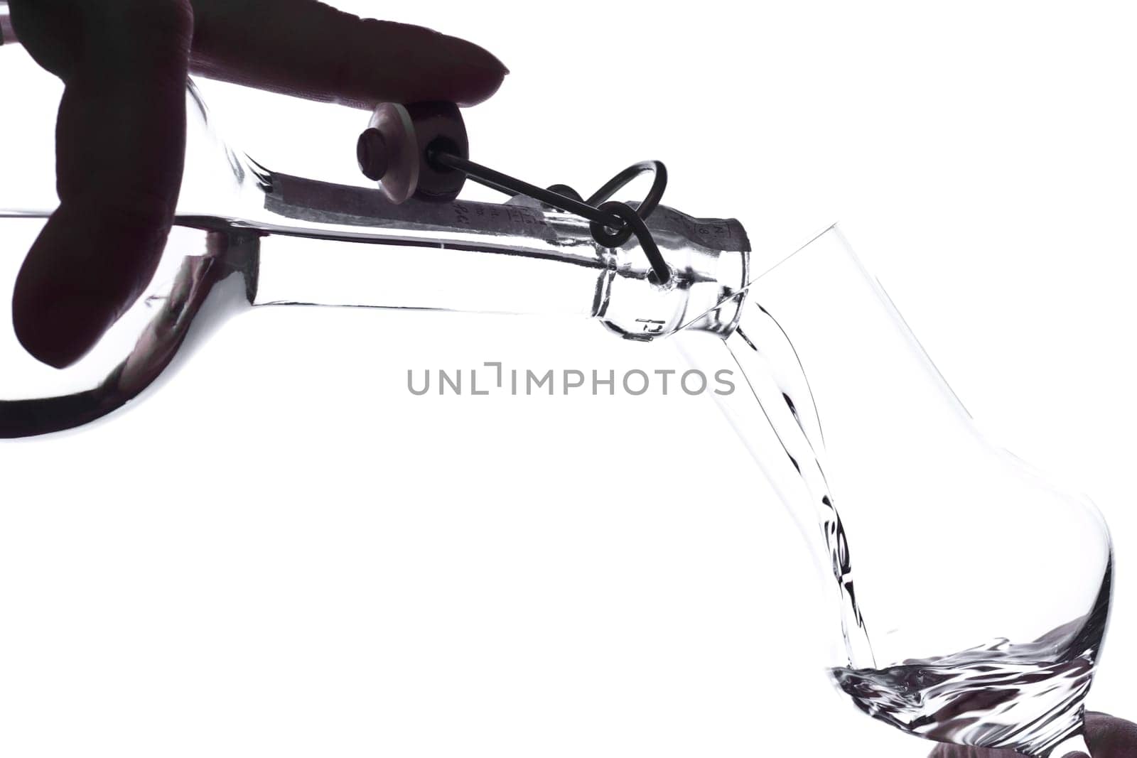 Liquor is poured into a glass