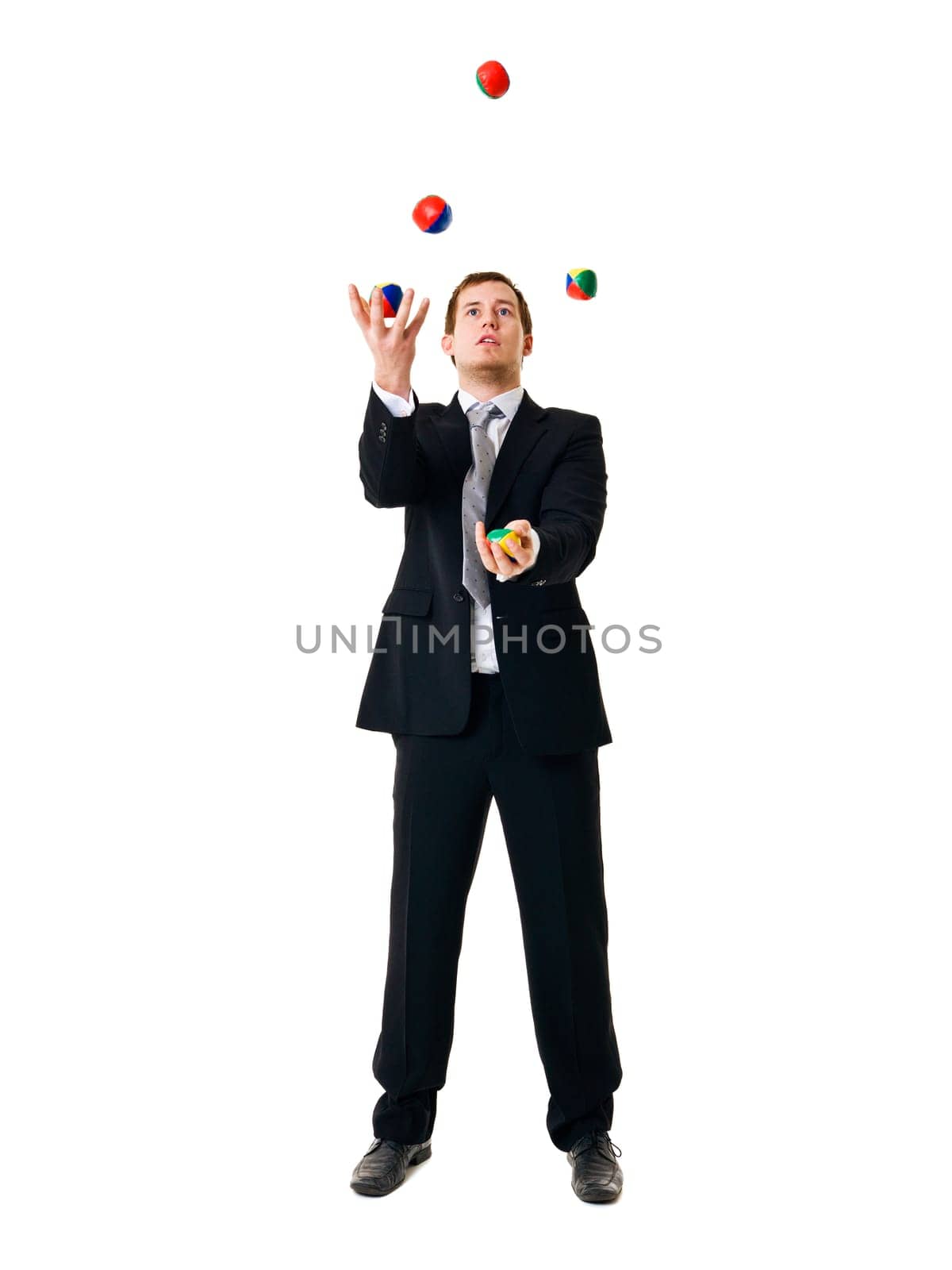 Juggling businessman isolated on white background