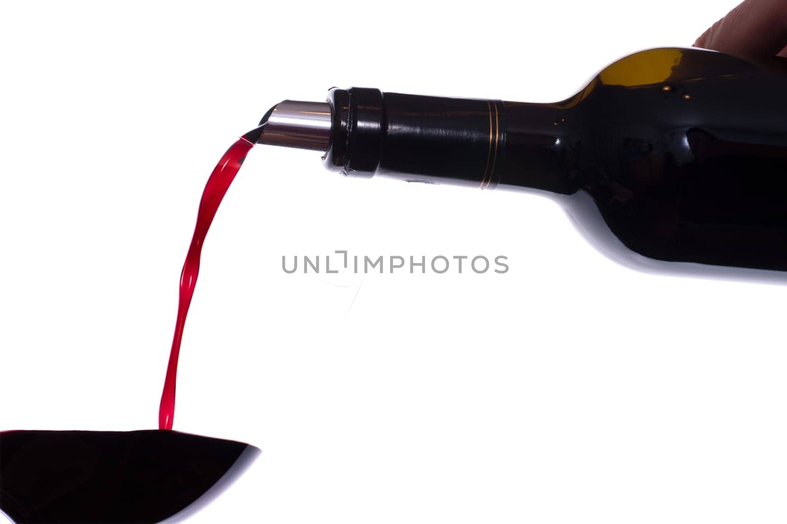 Wine is poured into a glass