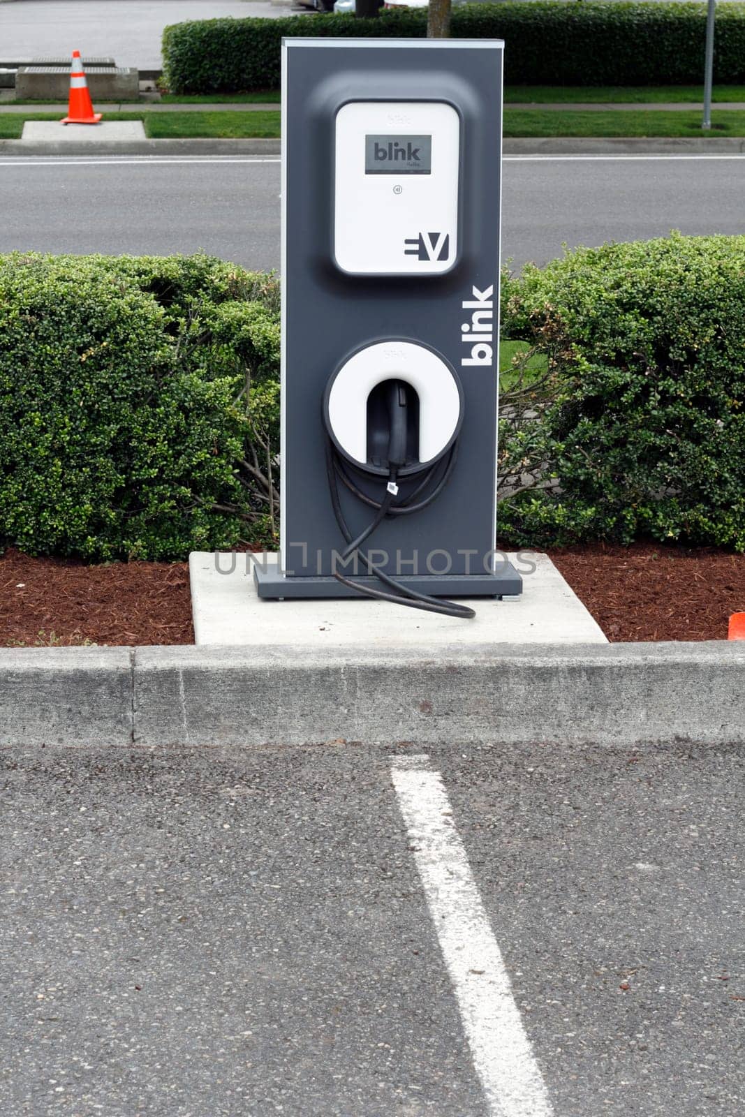 BEAVERTON, OREGON - JUNE 30: Blink electric vehicle charging station across from the city library on June 30, 2011 in Beaverton, Oregon. Some energy is supplied by photovoltaic (solar energy) panels.