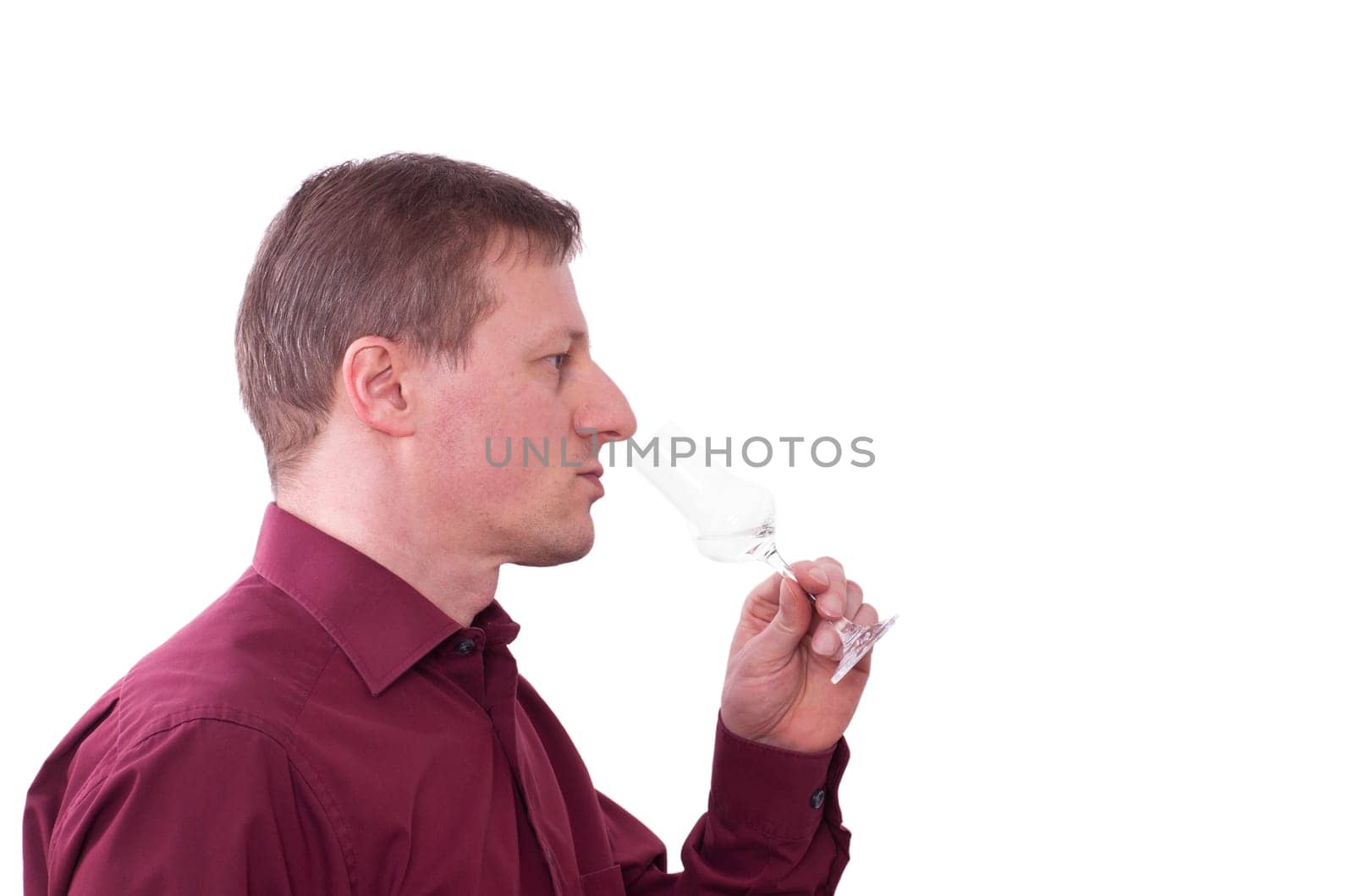 A man tastes a grappa