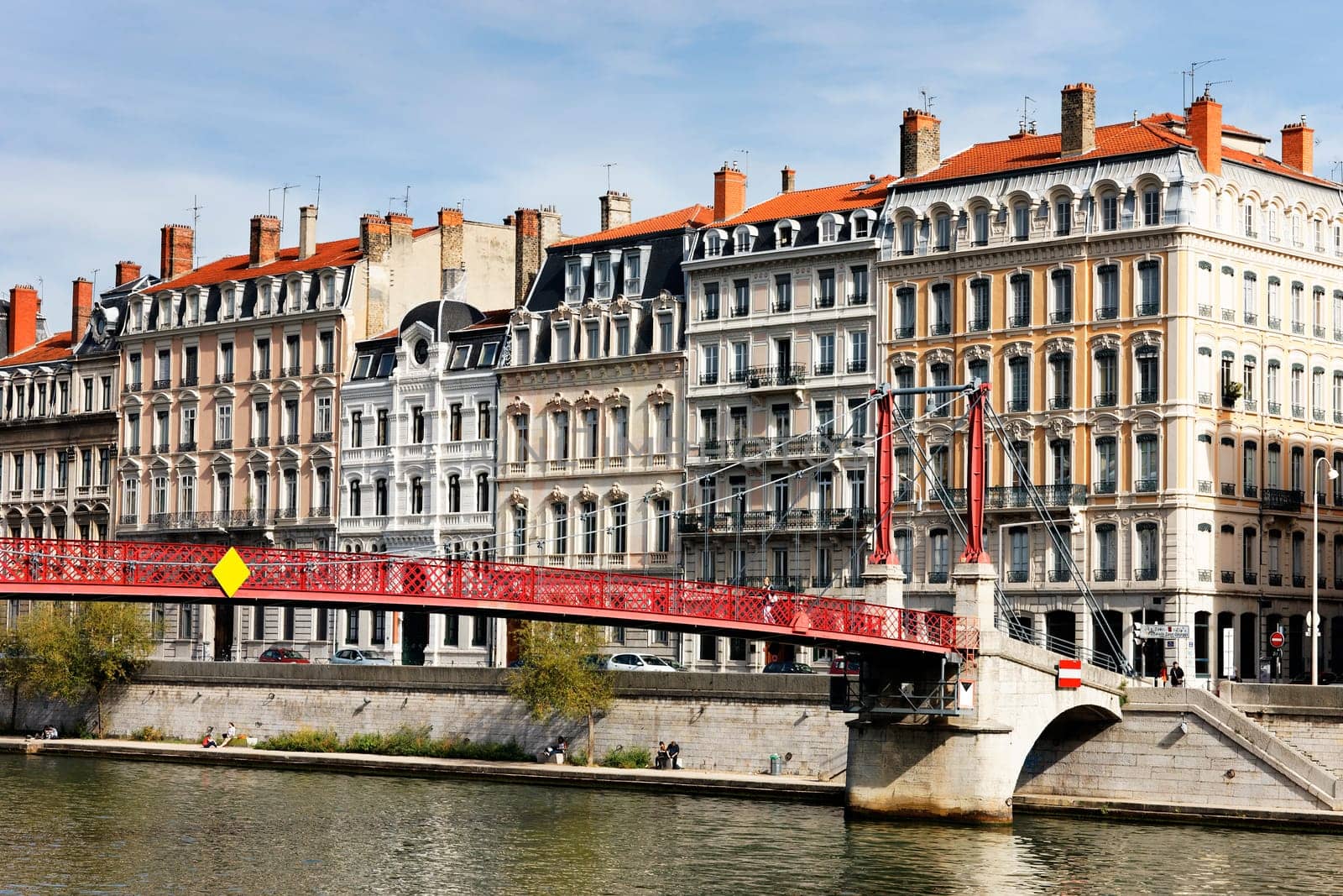 Lyon city with red footbridge in summer, France