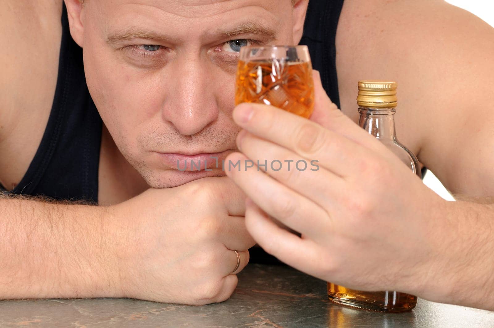 drunk man with a glass in his hand isolated on white background