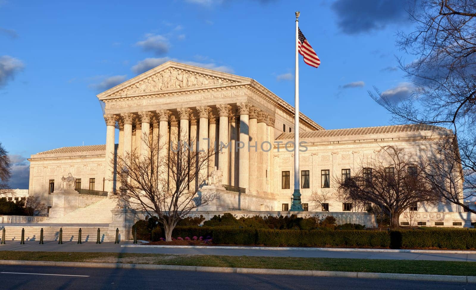 Late afternoon winter sun illuminates front of supreme court in Washington in winter