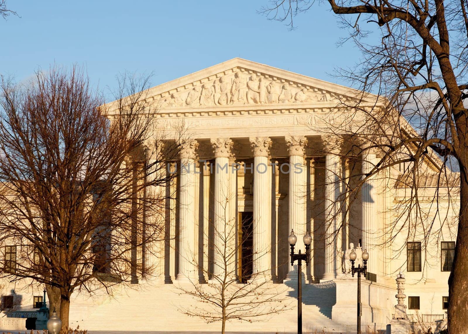 Late afternoon winter sun illuminates front of supreme court in Washington in winter