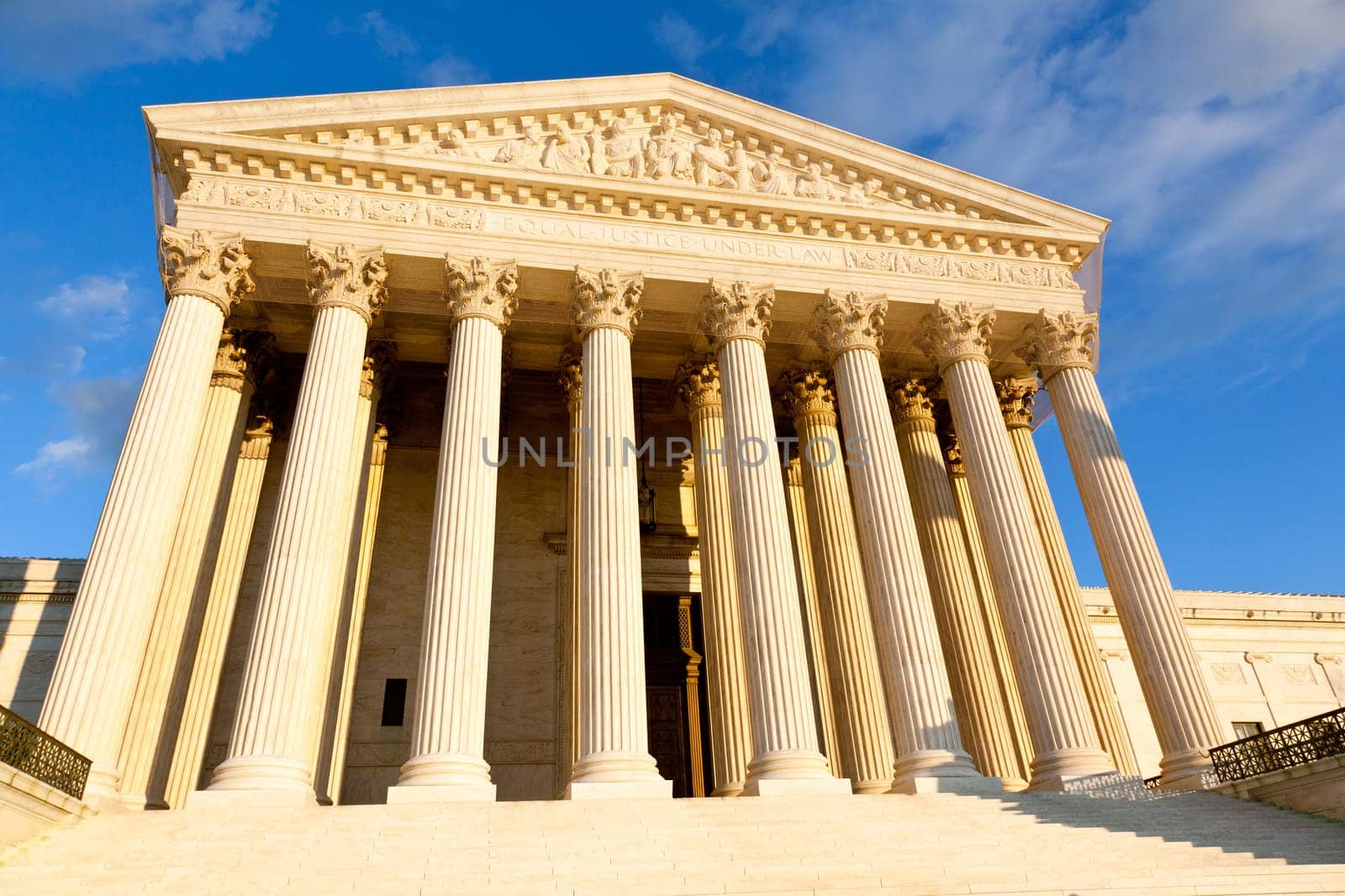 Late afternoon winter sun illuminates front of supreme court in Washington in winter