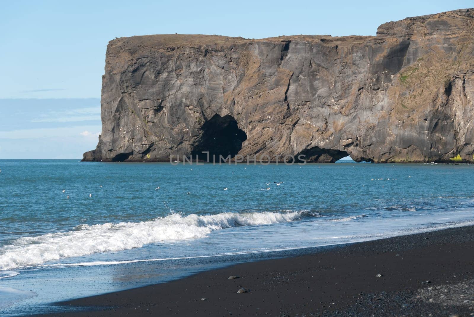 rocky cliff overlooking the sea in Vik in Iceland