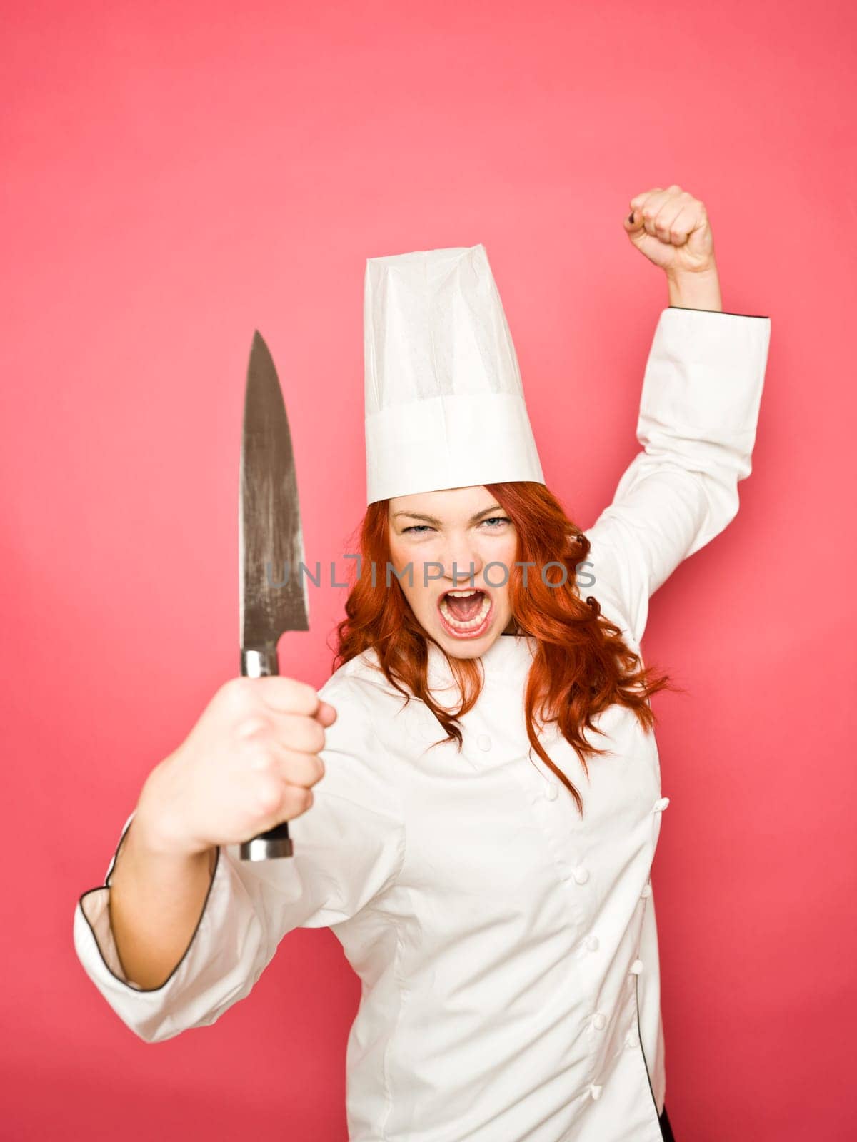 Female Chef on pink background