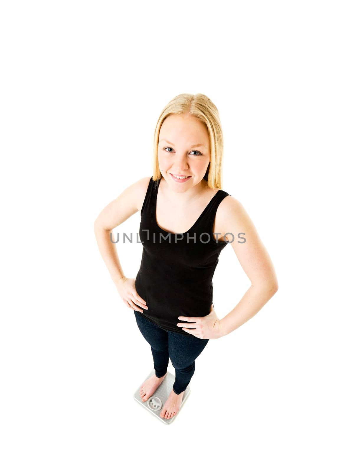 Young Girl on weight scale isolated on white background