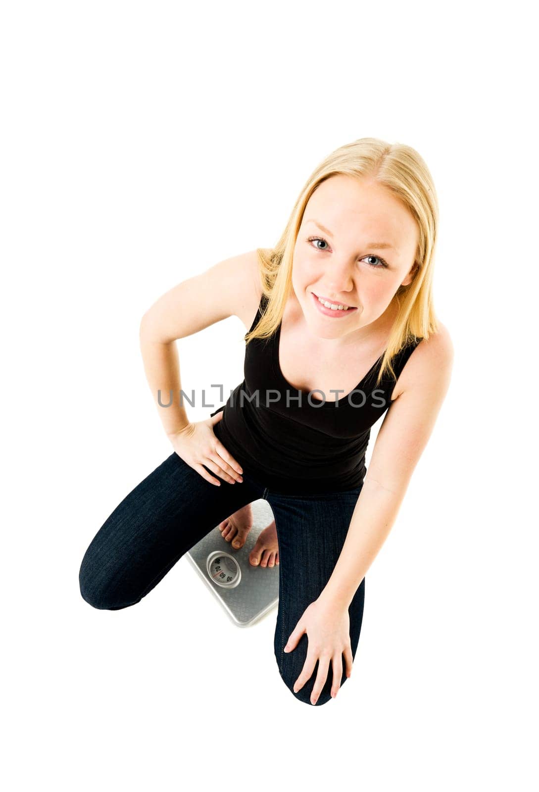 Young Girl on weight scale isolated on white background