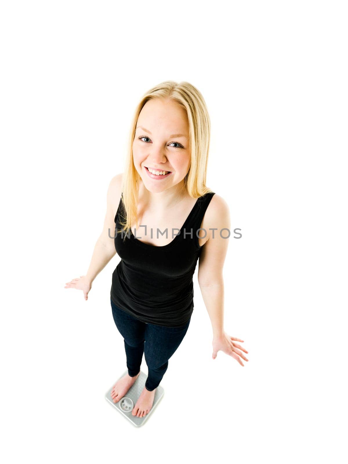 Young Girl on weight scale isolated on white background
