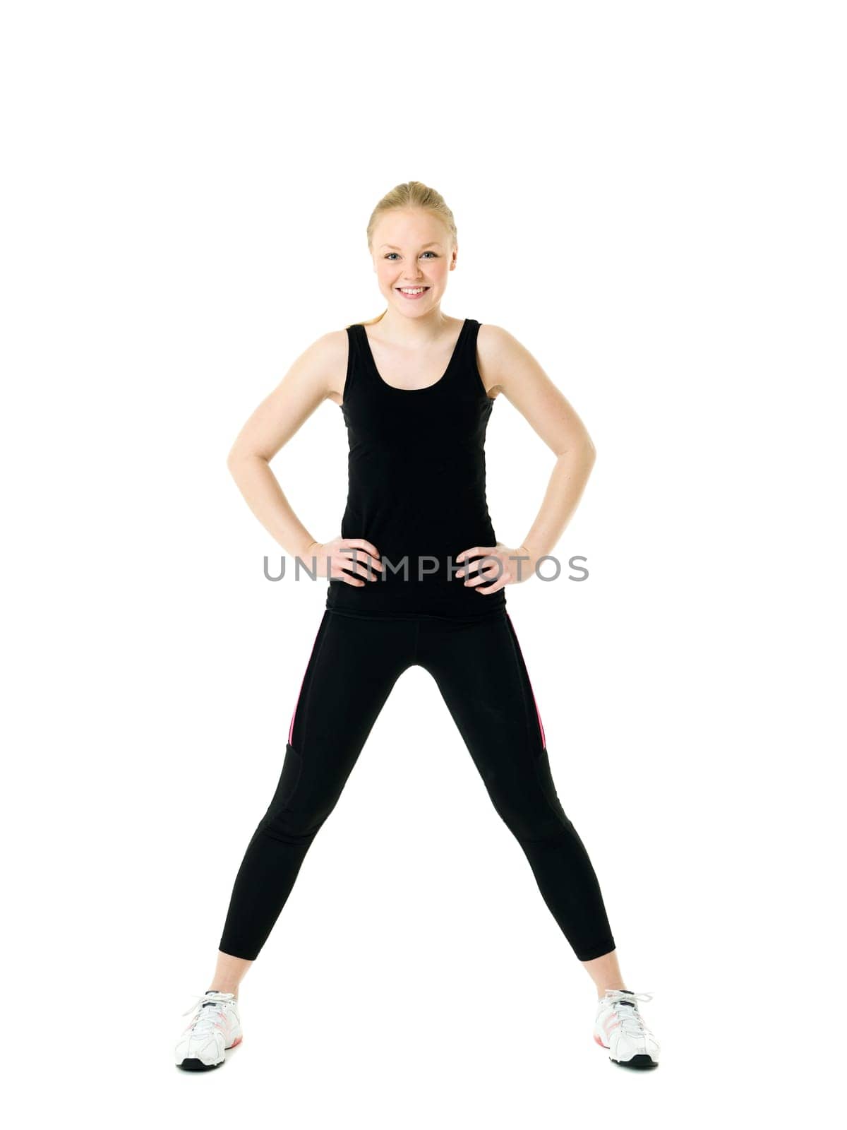 Young blond woman working out isolated on white background