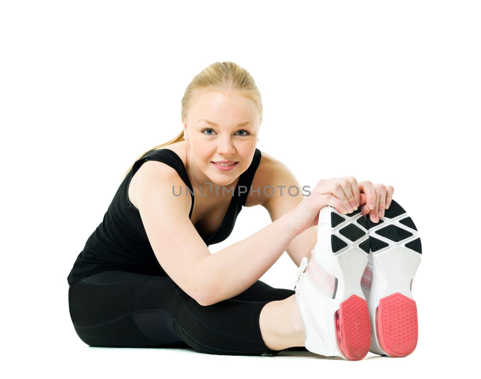 Young blond woman working out isolated on white background