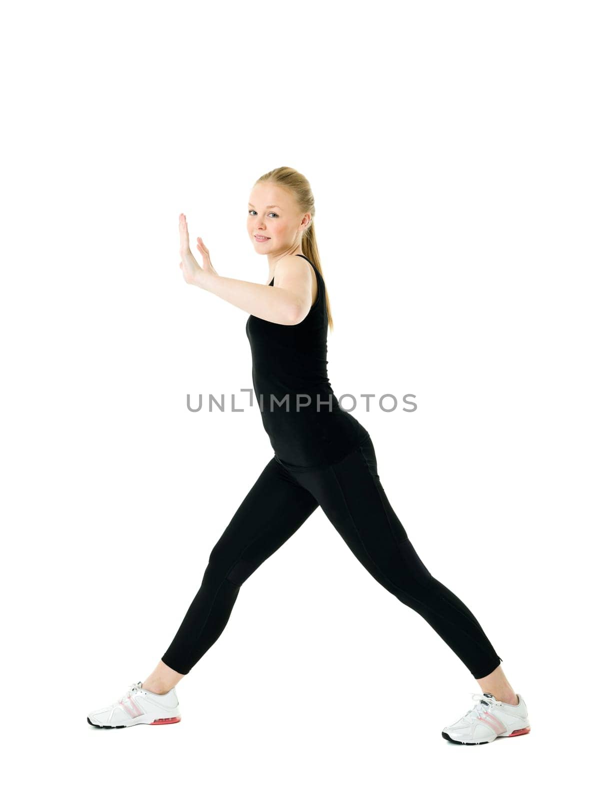 Young blond woman working out isolated on white background