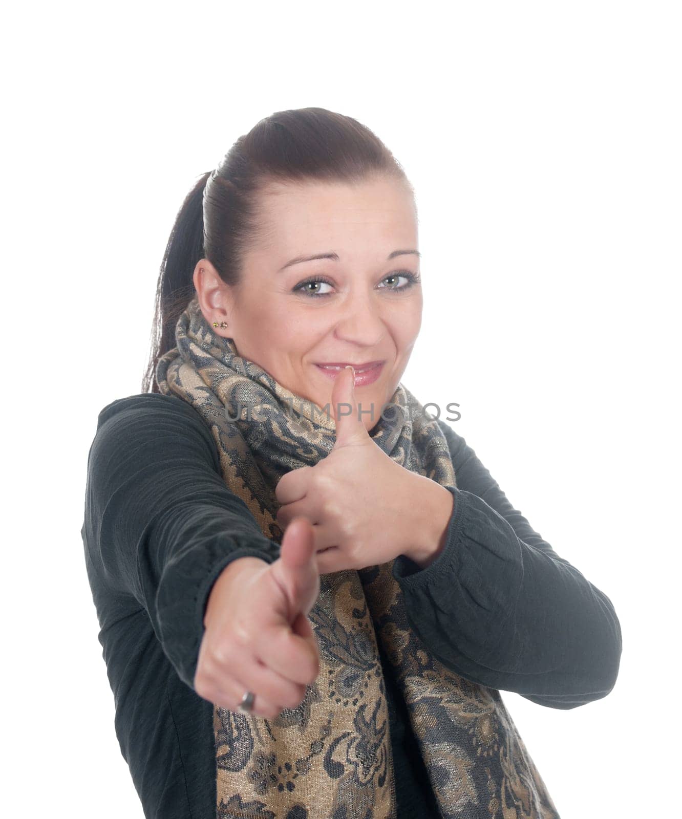 Young woman showing thumbs up