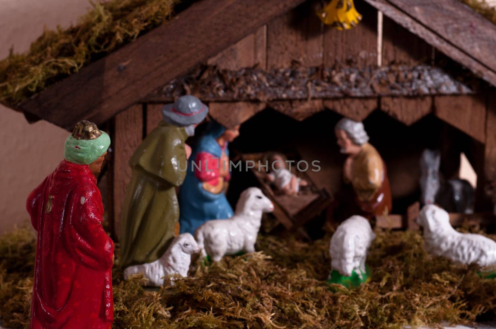 Nativity scene with a king,sheep and the Christ child
