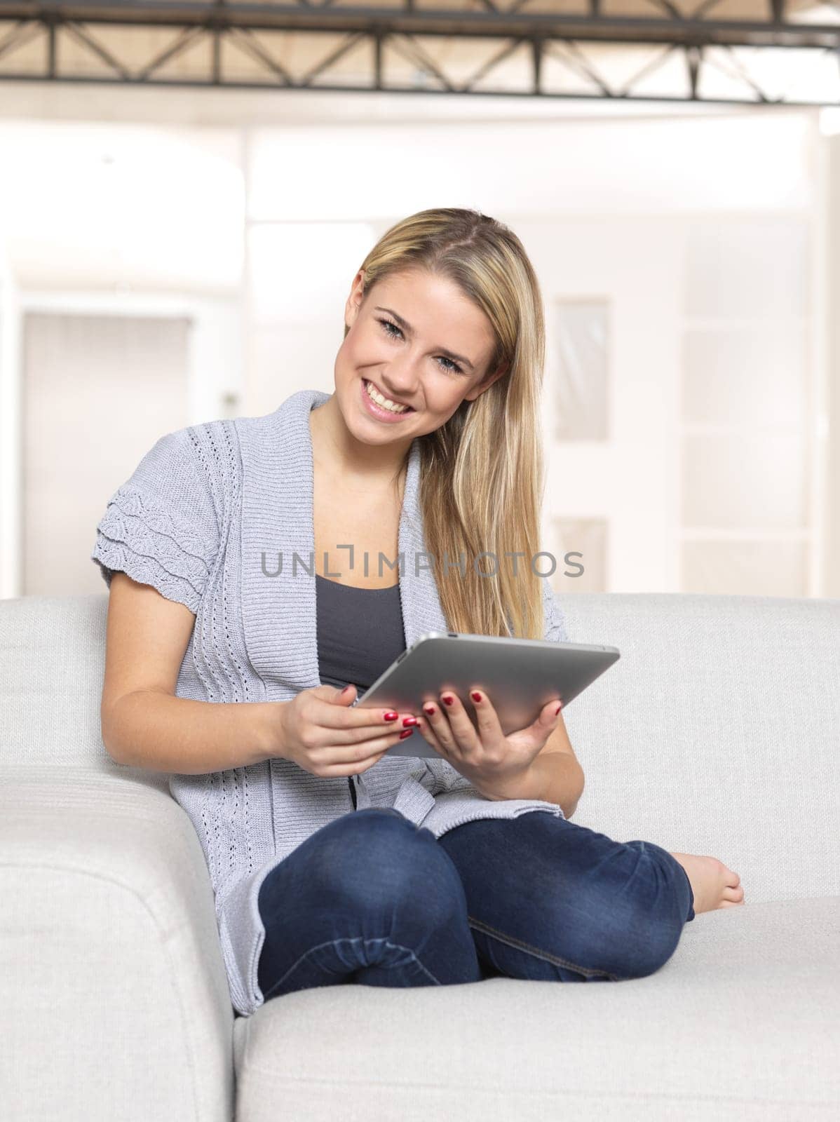 Young woman using tablet computer