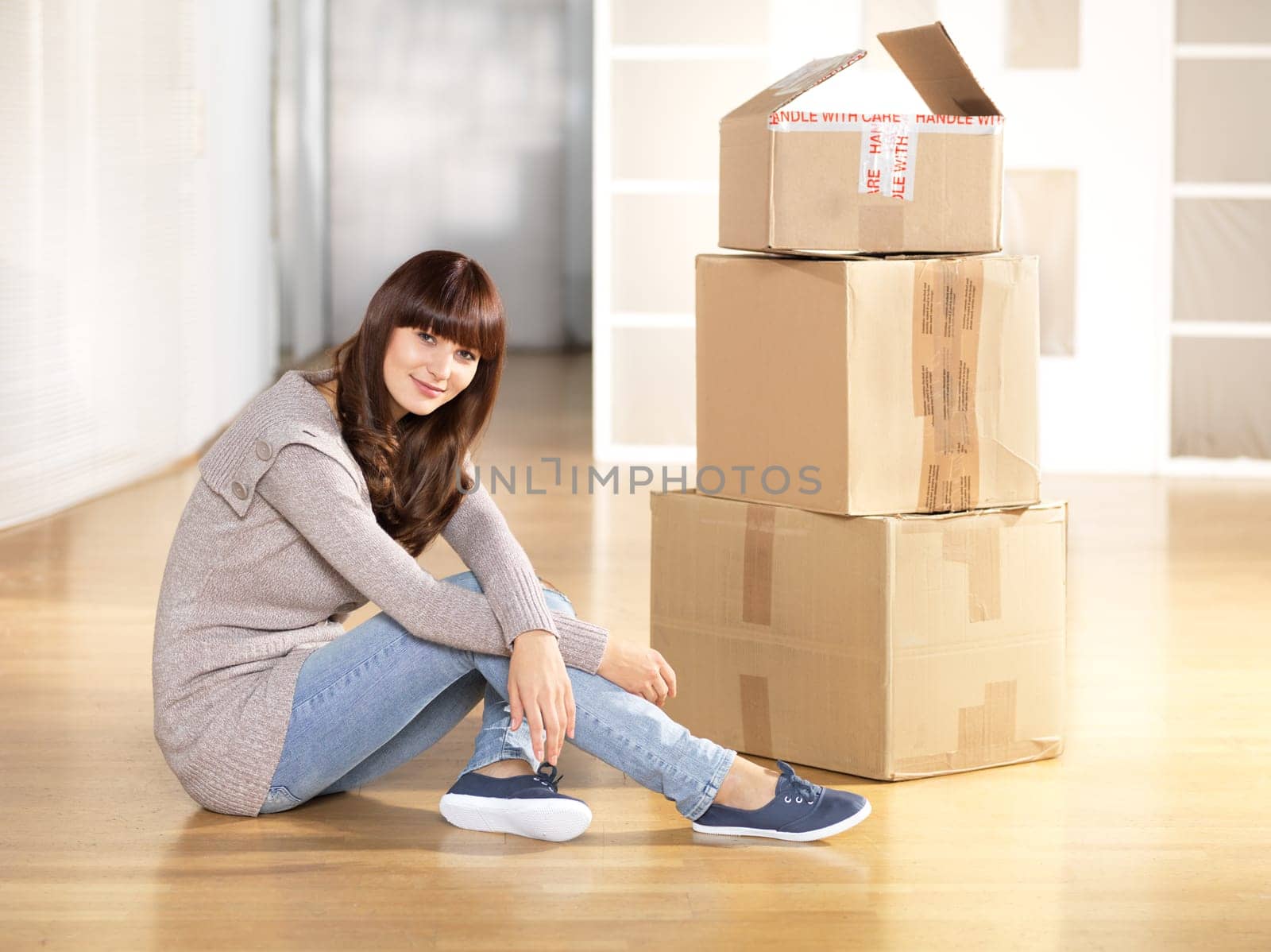 Young woman with moving boxes