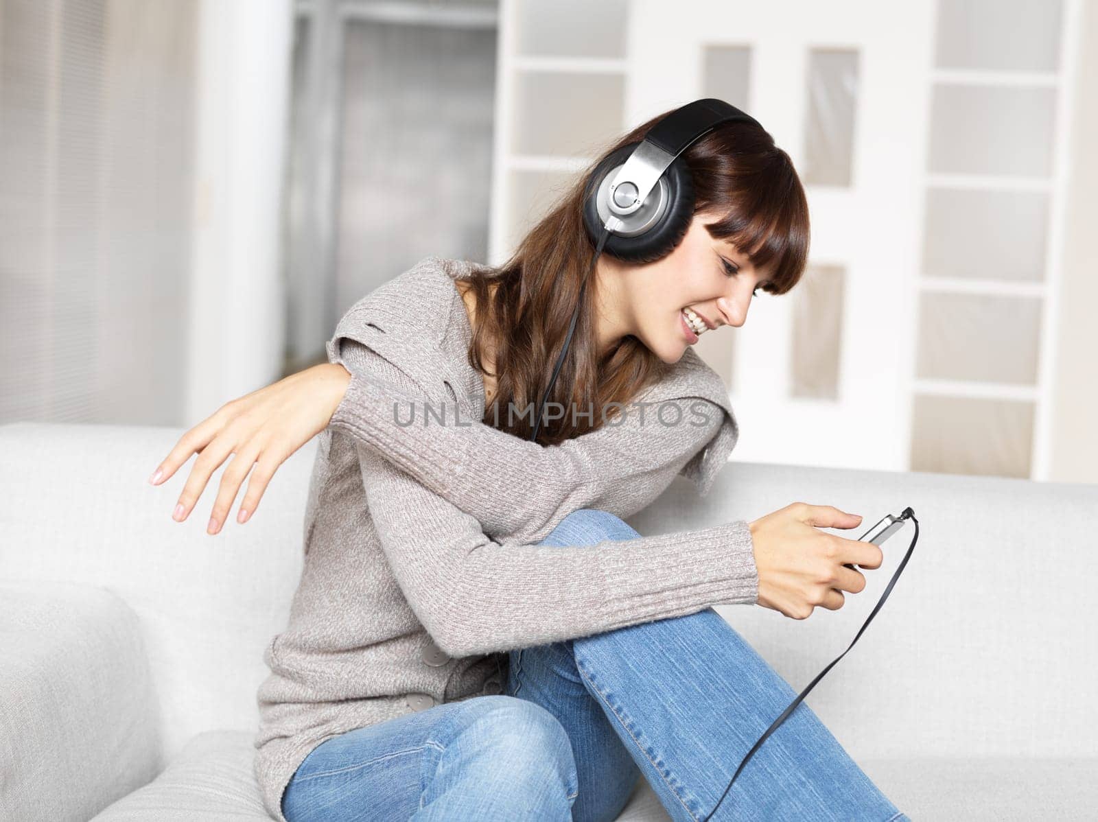 Young woman listening to music