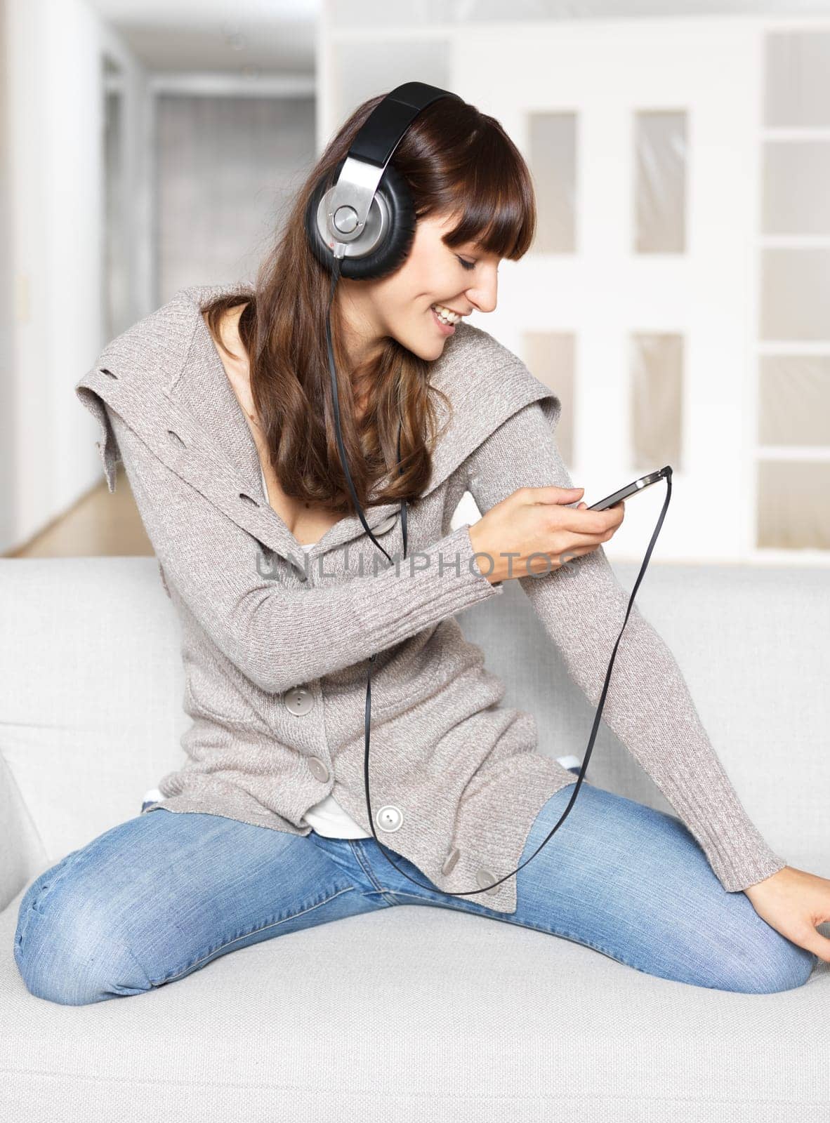 Young woman listening to music