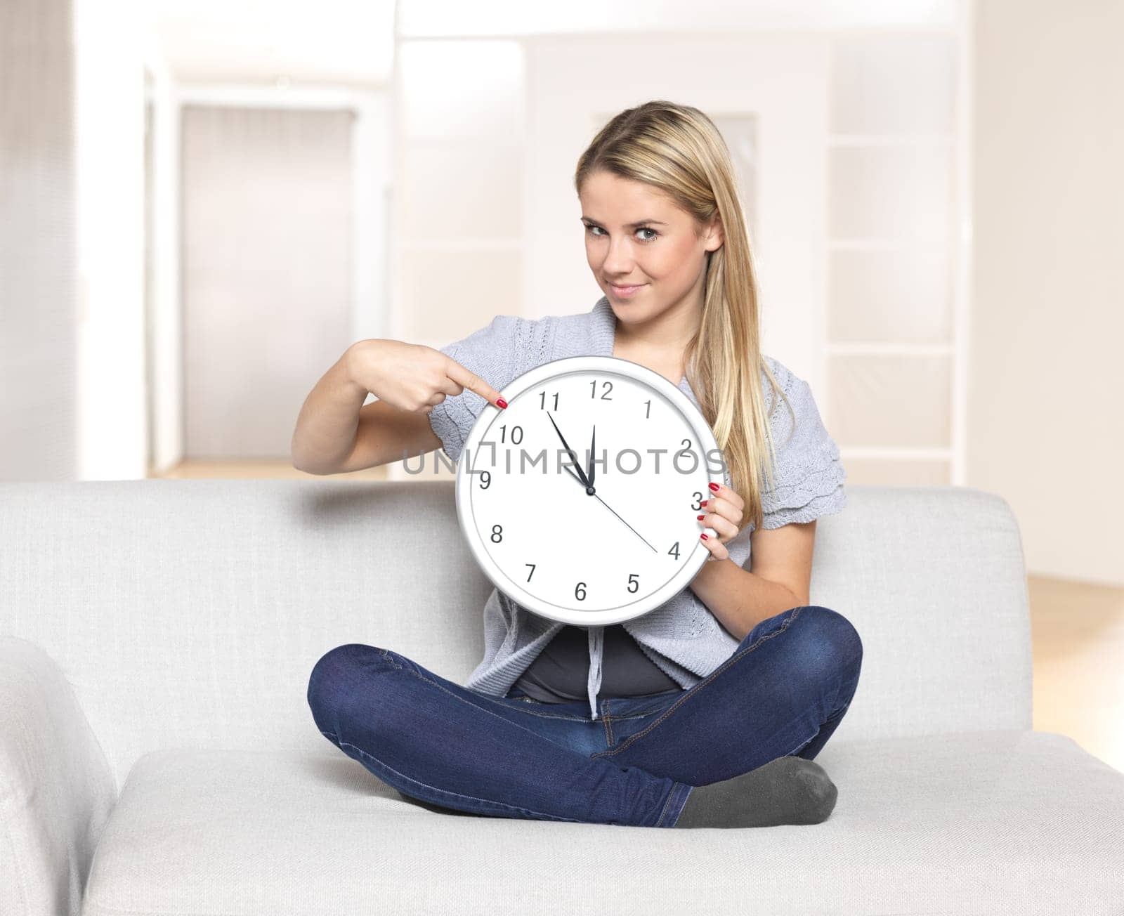 It's 5 to 12,Young Woman Pointing to Clock