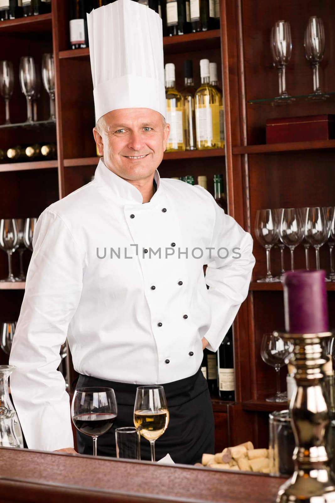 Chef cook wine bar professional standing confident in restaurant