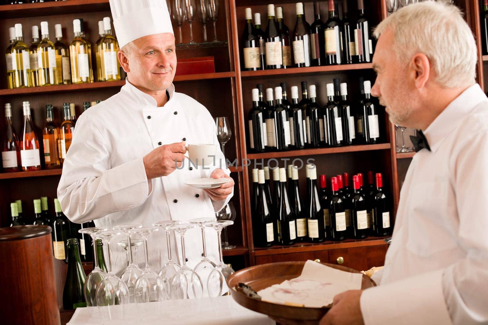 Chef cook drink coffee waiter serve on tray in restaurant