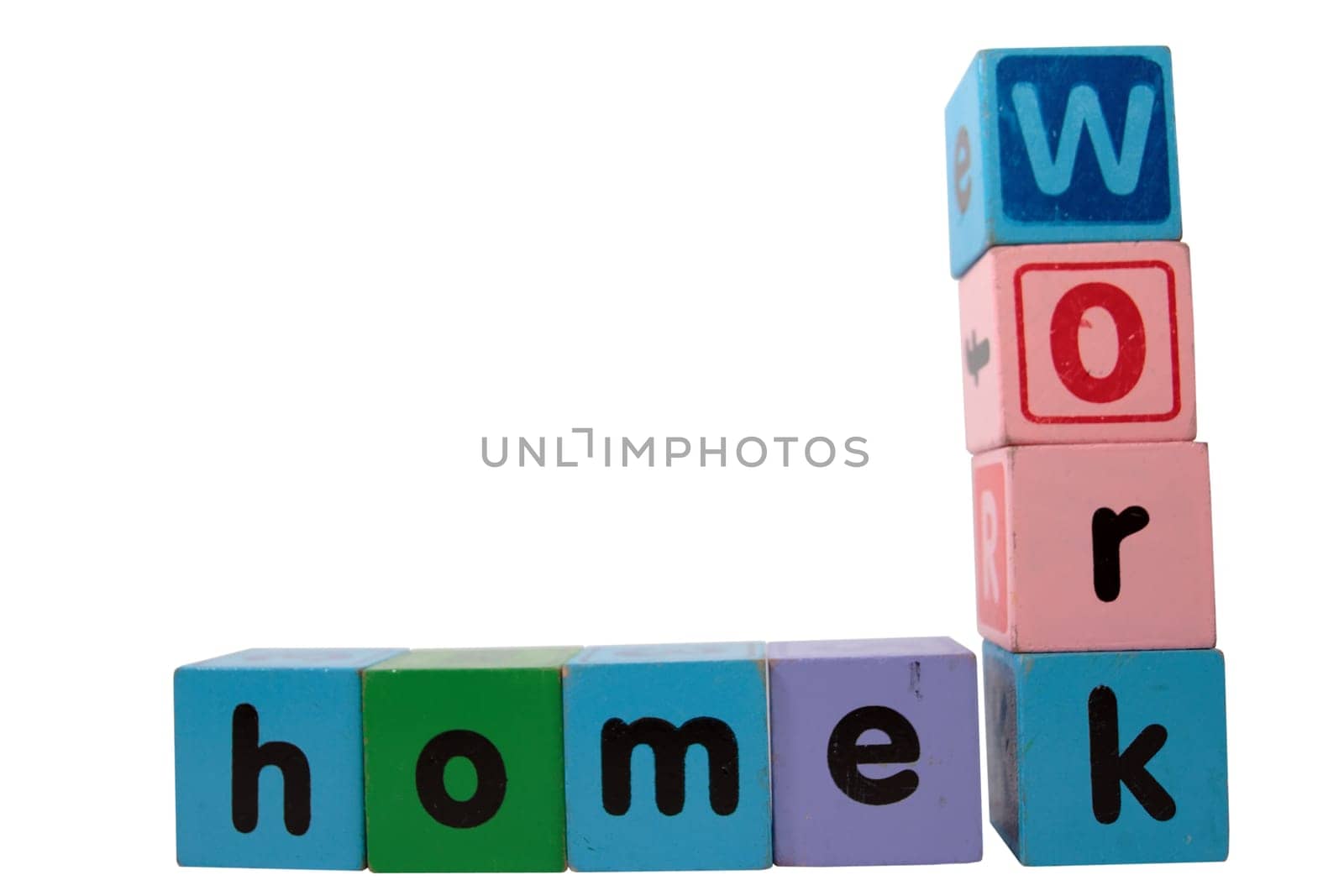 toy letters that spell homework against a white background with clipping path