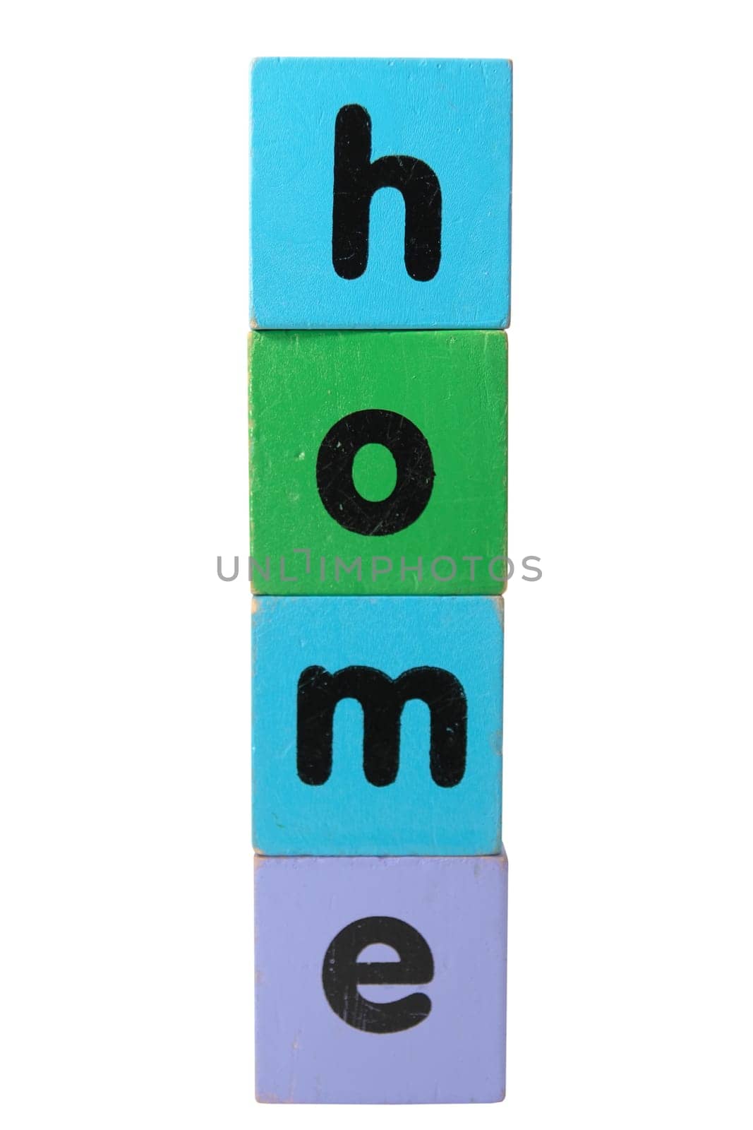 toy letters that spell home against a white background with clipping path
