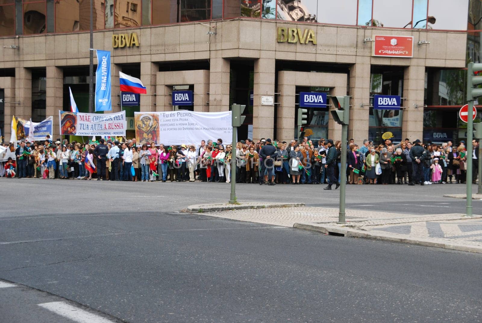 LISBON - MAY 11: 2010 portuguese crowd waiting for Pope Benedict XVI, born Joseph Alois Ratzinger is the 265th and reigning Pope, he succeeded Pope John Paul II on May 11, 2010 in Lisbon, Portugal.