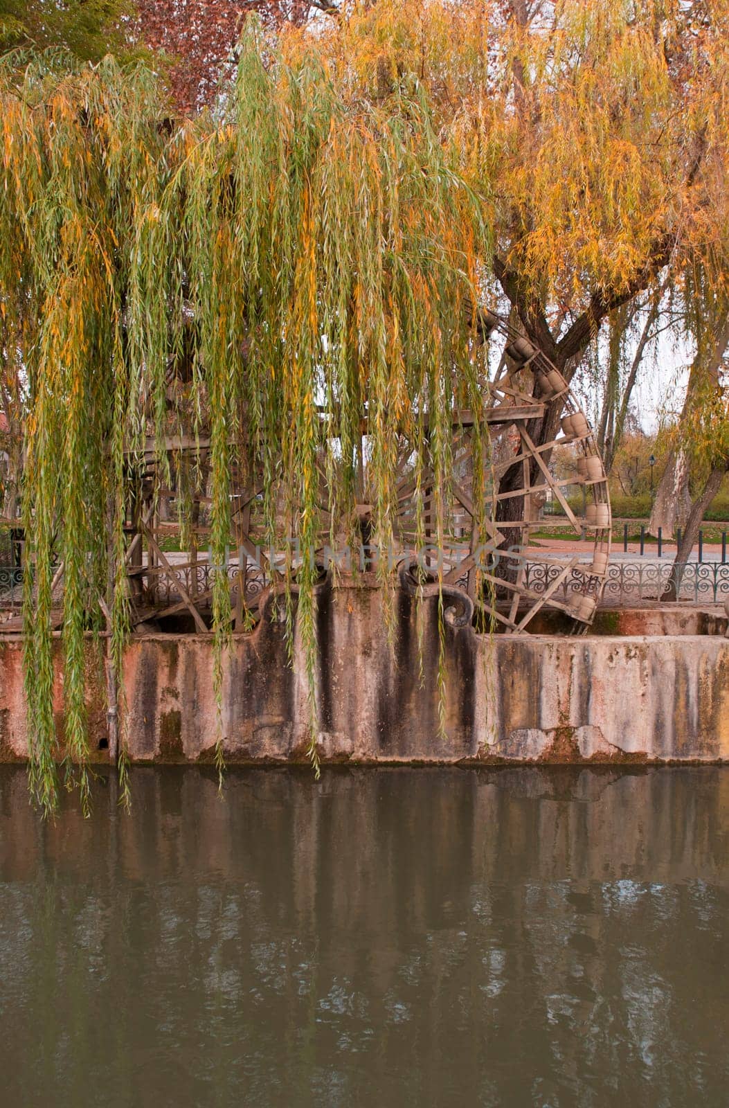 traditional watermill structure surrounded by trees in Tomar, Portugal