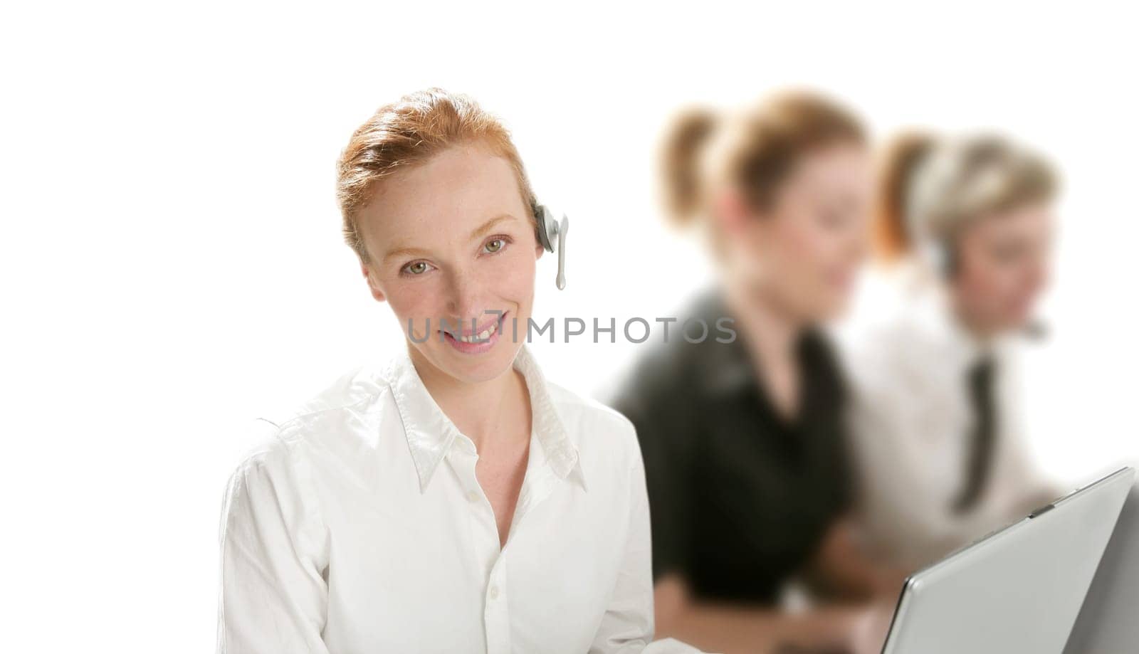 Business helpdesk with beautiful woman and headphones micro