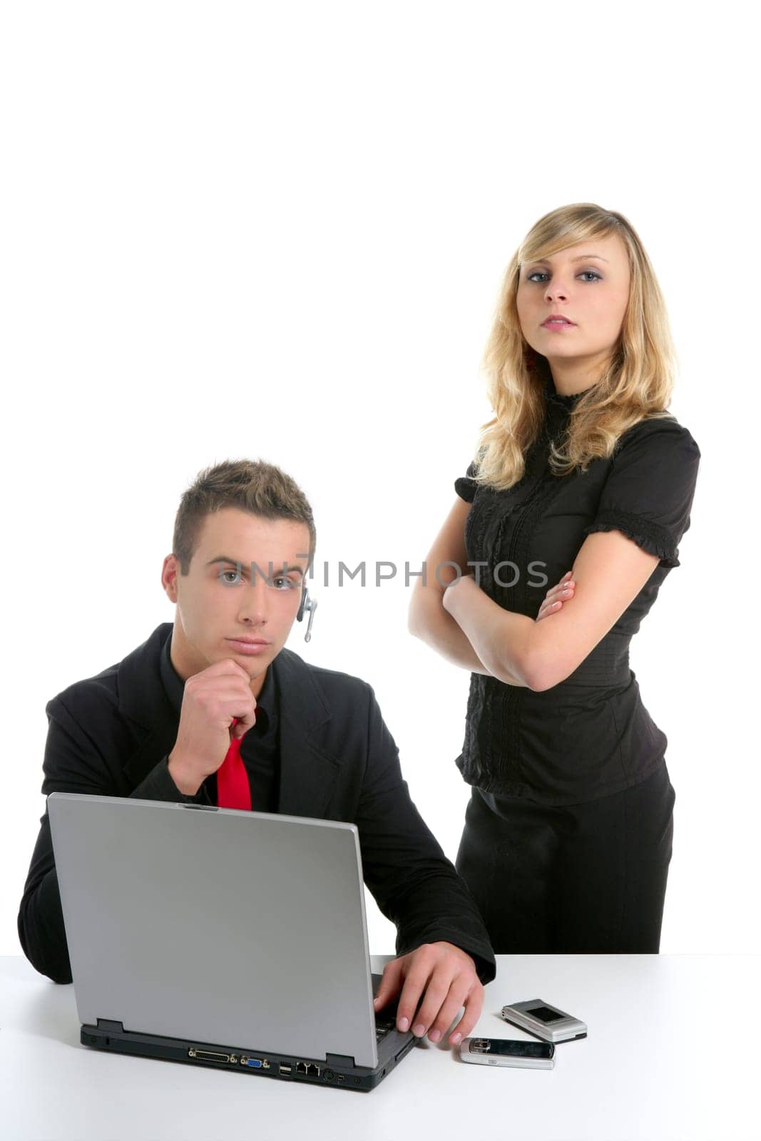 Portrait of businesspeople with laptop, businessman and businesswoman