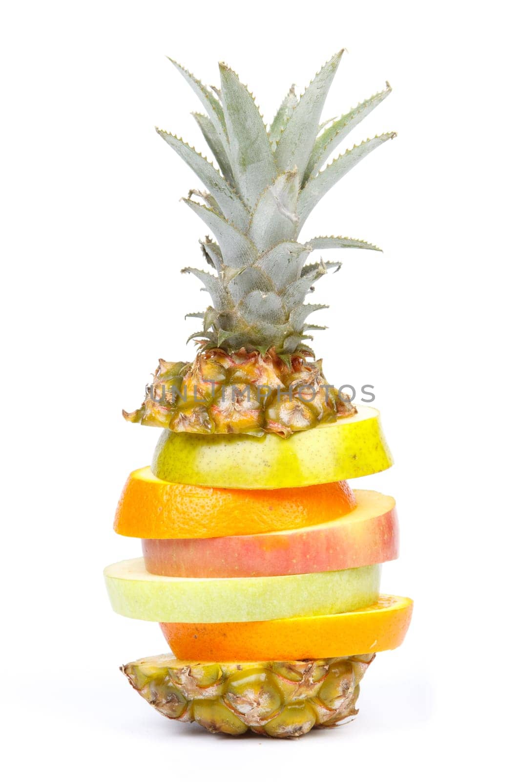 Mixed sliced fruit on a white background. Close up.