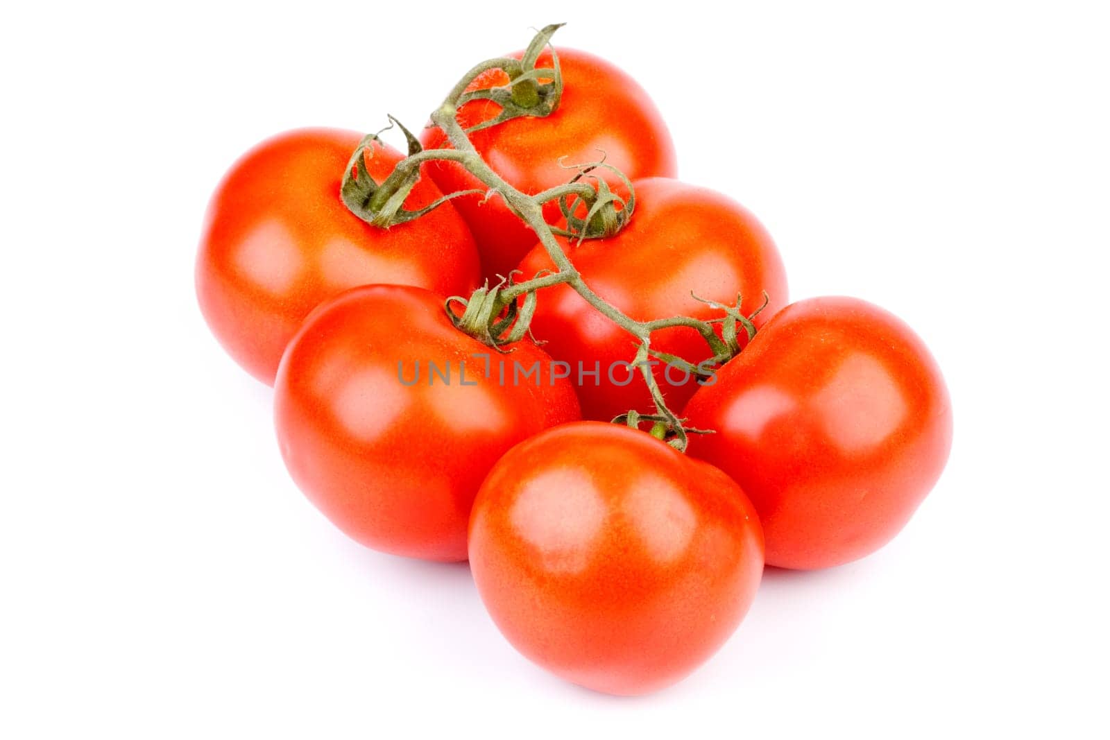 Fresh appetizing tomatoes on a white background. Close up.