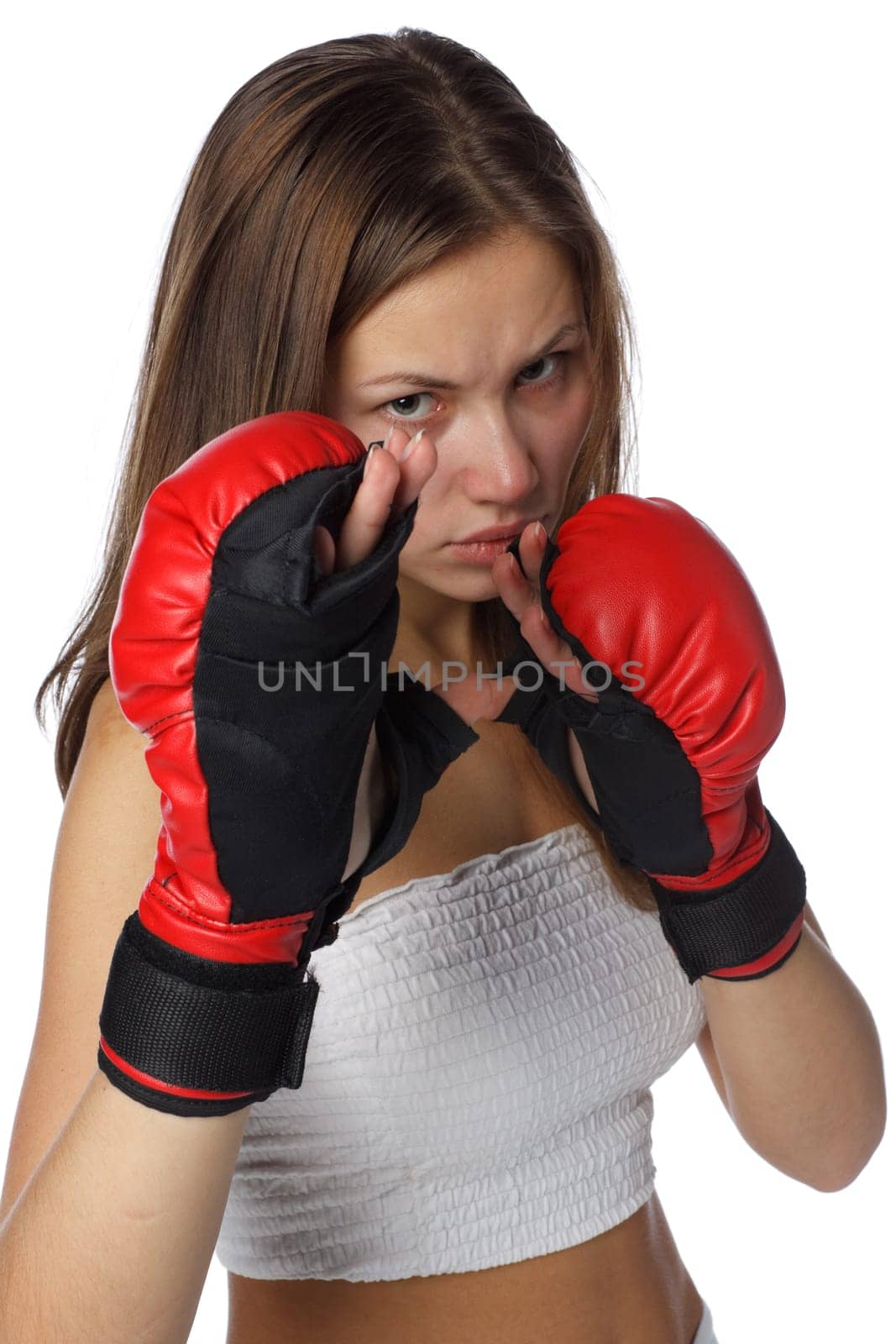 Sporty girl in red fighting gloves on a white background.
