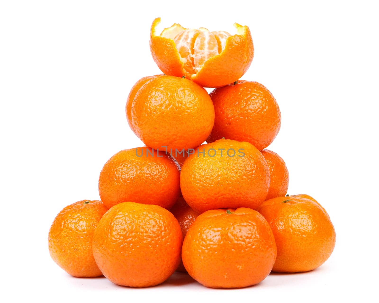 Fresh tangerines on a white background. Close up.